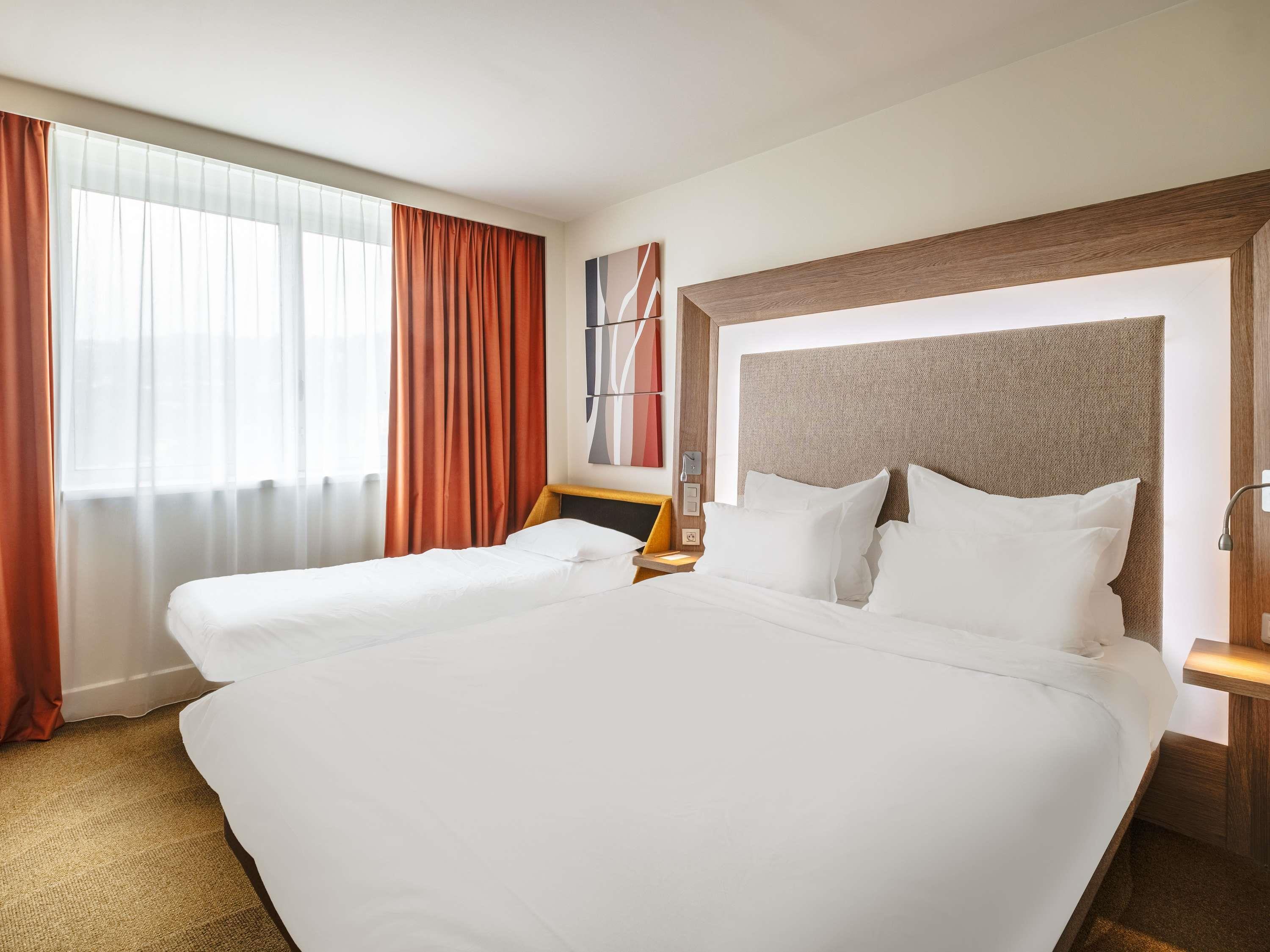 Novotel Lyon Confluence Room Type - Classic Room with 1 double bed and 1 single sofa bed