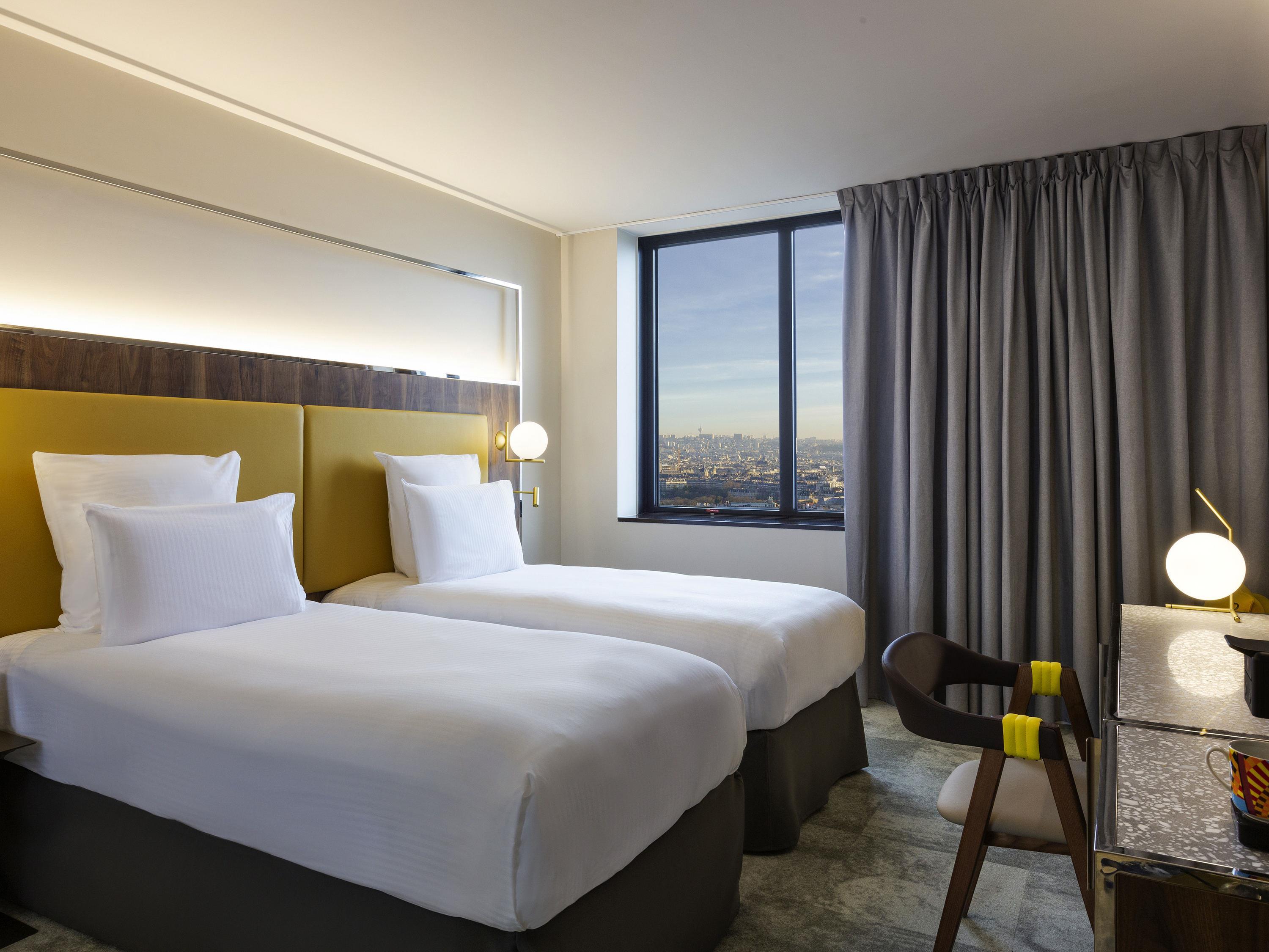 Pullman Paris Montparnasse Room Type - DELUXE ROOM, 2 single beds, view of Paris Pullman Paris Montparnasse Room Type - DELUXE ROOM, 2 single beds, view of Paris