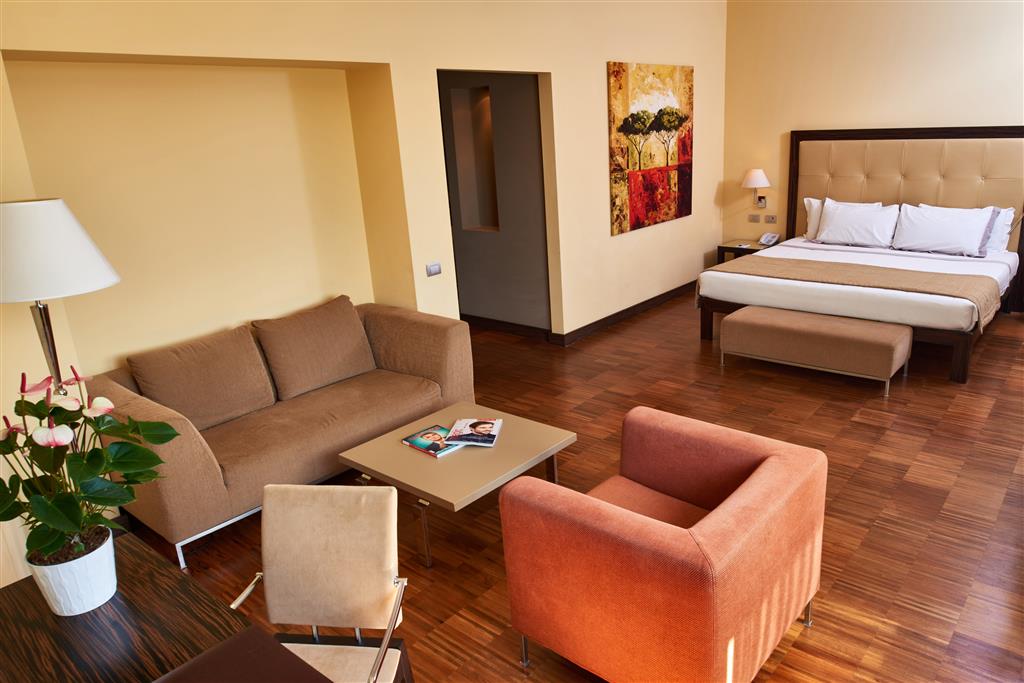 Cruise Hotel-guestroom-Guest Room,King bed,Suite,Indoor/Interior,On-Site.jpg