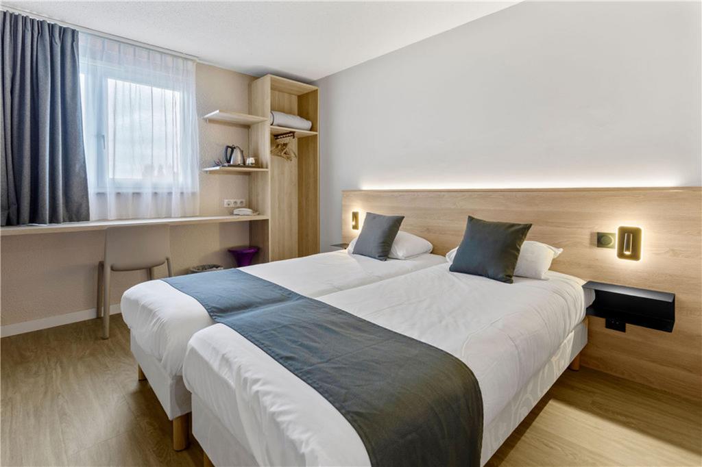 KYRIAD DEAUVILLE - SAINT ARNOULT-guestroom-Guest Room,On-Site.jpg