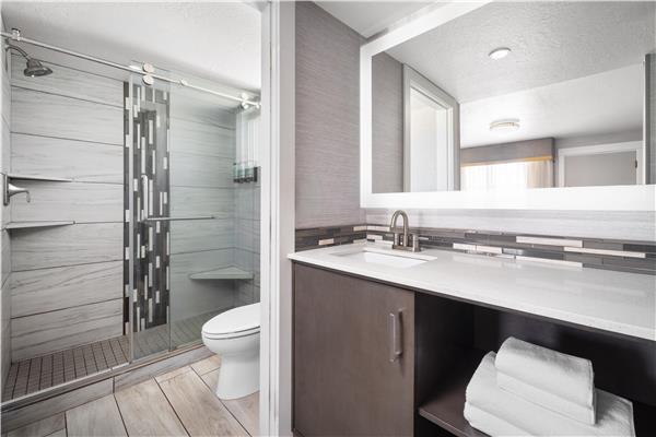 1 Queen 1 Double, Non-Smoking, Two Bedrooms, High Speed Internet Access, 50 Inch Flat Screen Television, Microwave And Refrigerator, Coffee Maker, Full Breakfast