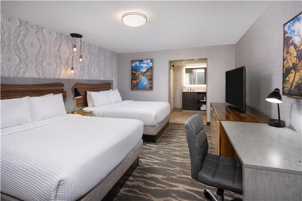 2 Queen Beds, Non-Smoking, High Speed Internet Access, 50 Inch Flat Screen Television, Microwave And Refrigerator, Coffee Maker, Hairdryer, Full Breakfast