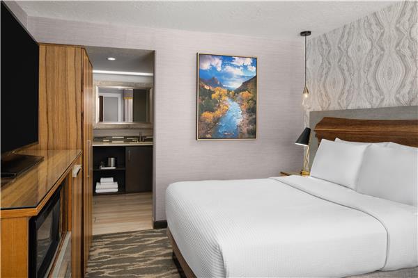 1 Queen 1 Double, Non-Smoking, Two Bedrooms, High Speed Internet Access, 50 Inch Flat Screen Television, Microwave And Refrigerator, Coffee Maker, Full Breakfast