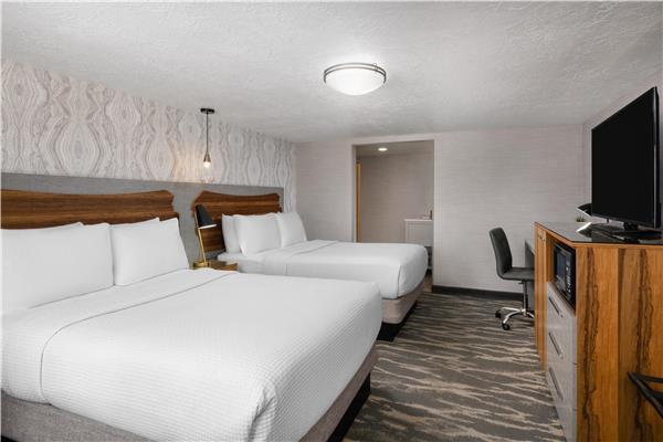 2 Double Beds, Non-Smoking, High Speed Internet Access, 50 Inch Flat Screen Television, Microwave And Refrigerator, Coffee Maker, Hairdryer, Full Breakfast