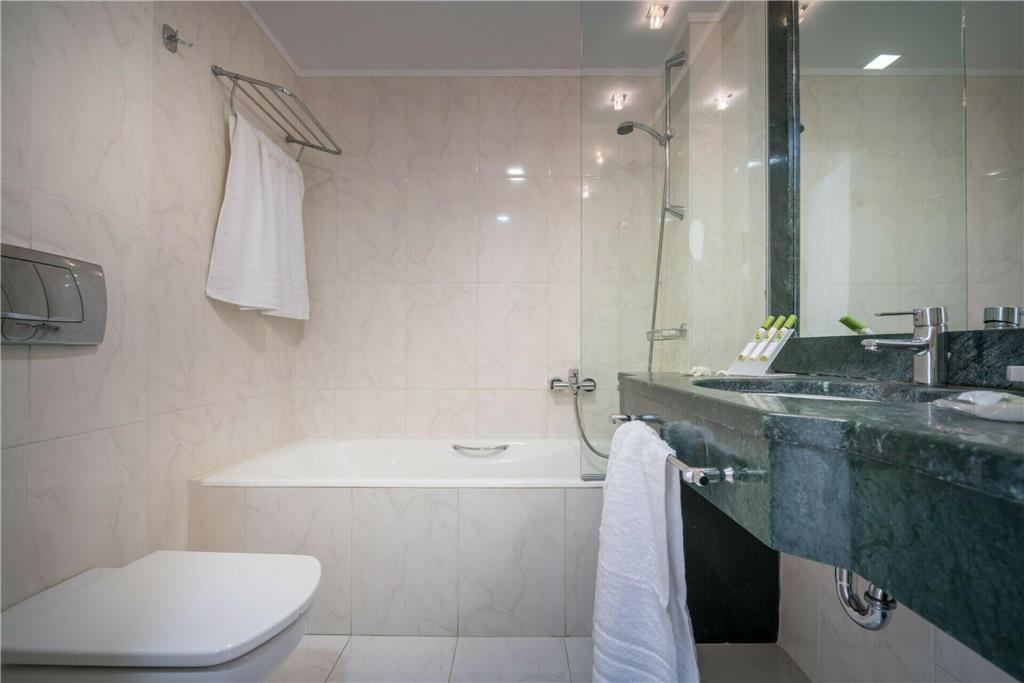 Galaxy Beach Resort, BW Premier Collection-guestroom-Guest Room,Bathroom,On-Site.jpg