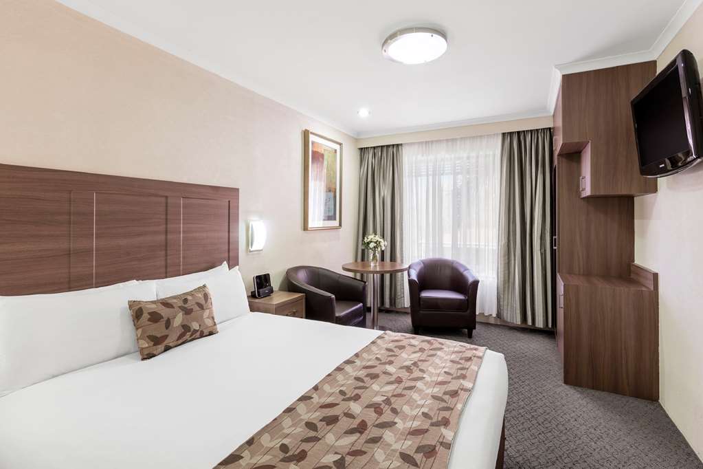 Garden City Hotel, BW Signature Collection-guestroom-Guest Room,On-Site.jpg
