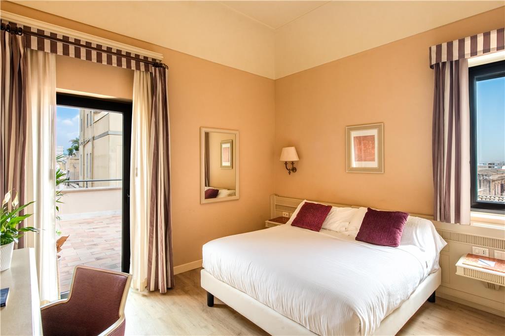 Best Western Hotel Stella D'Italia-guestroom-Guest Room,Bed,King bed,Indoor/Interior,On-Site.jpg
