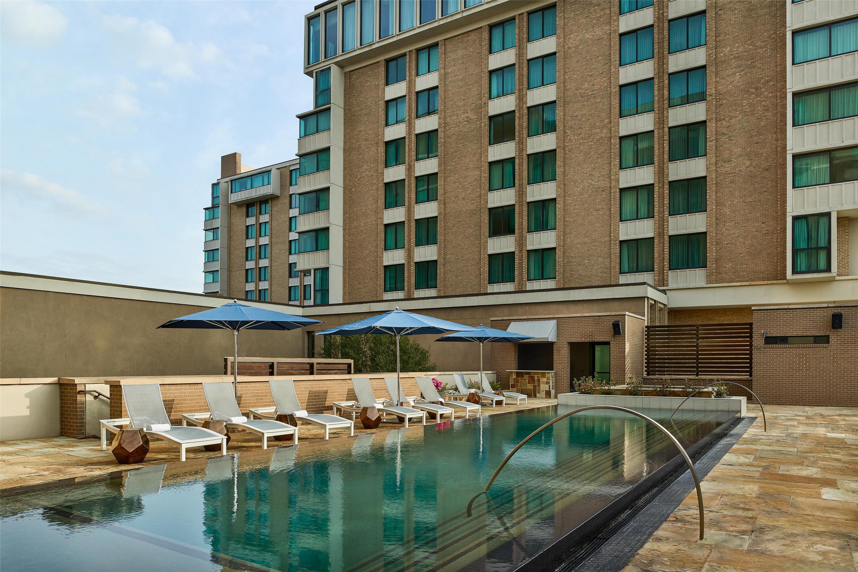 Pool | The Highland Dallas, Curio Collection by Hilton