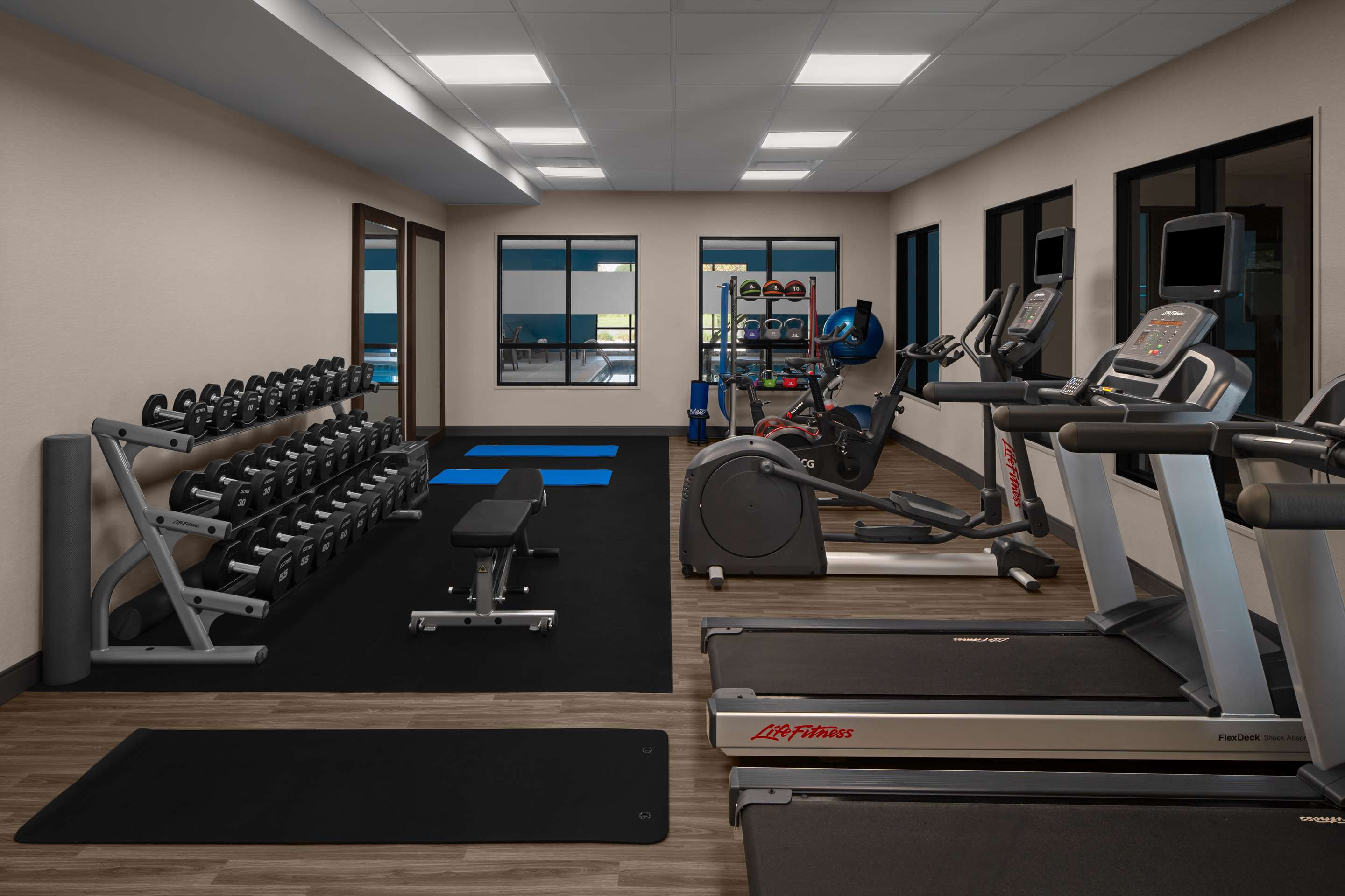 Health club fitness center gym | Hampton Inn & Suites Grand Rapids-Airport 28th St