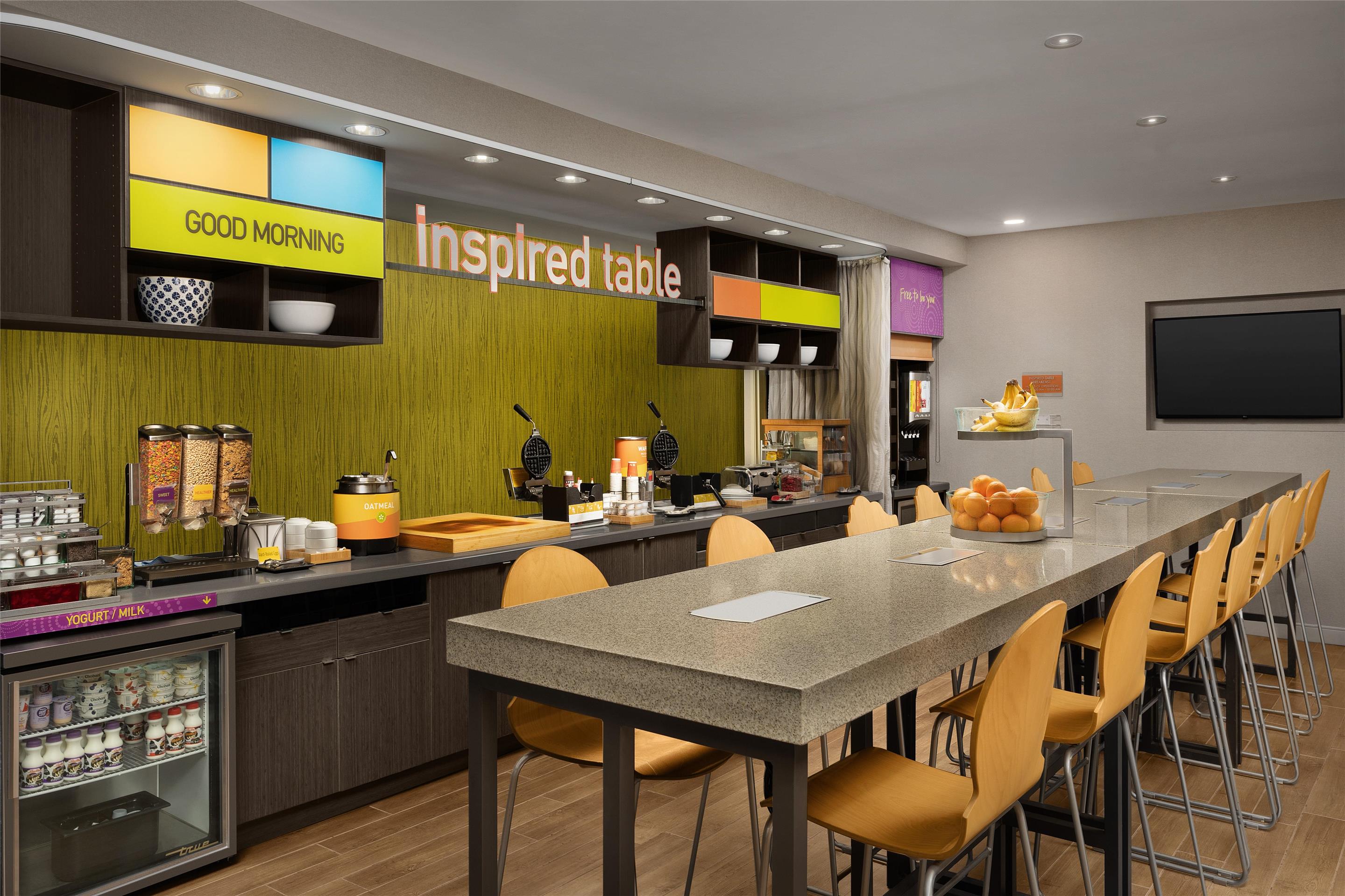 Breakfast Area | Home2 Suites by Hilton Huntsville/Research Park Area, AL