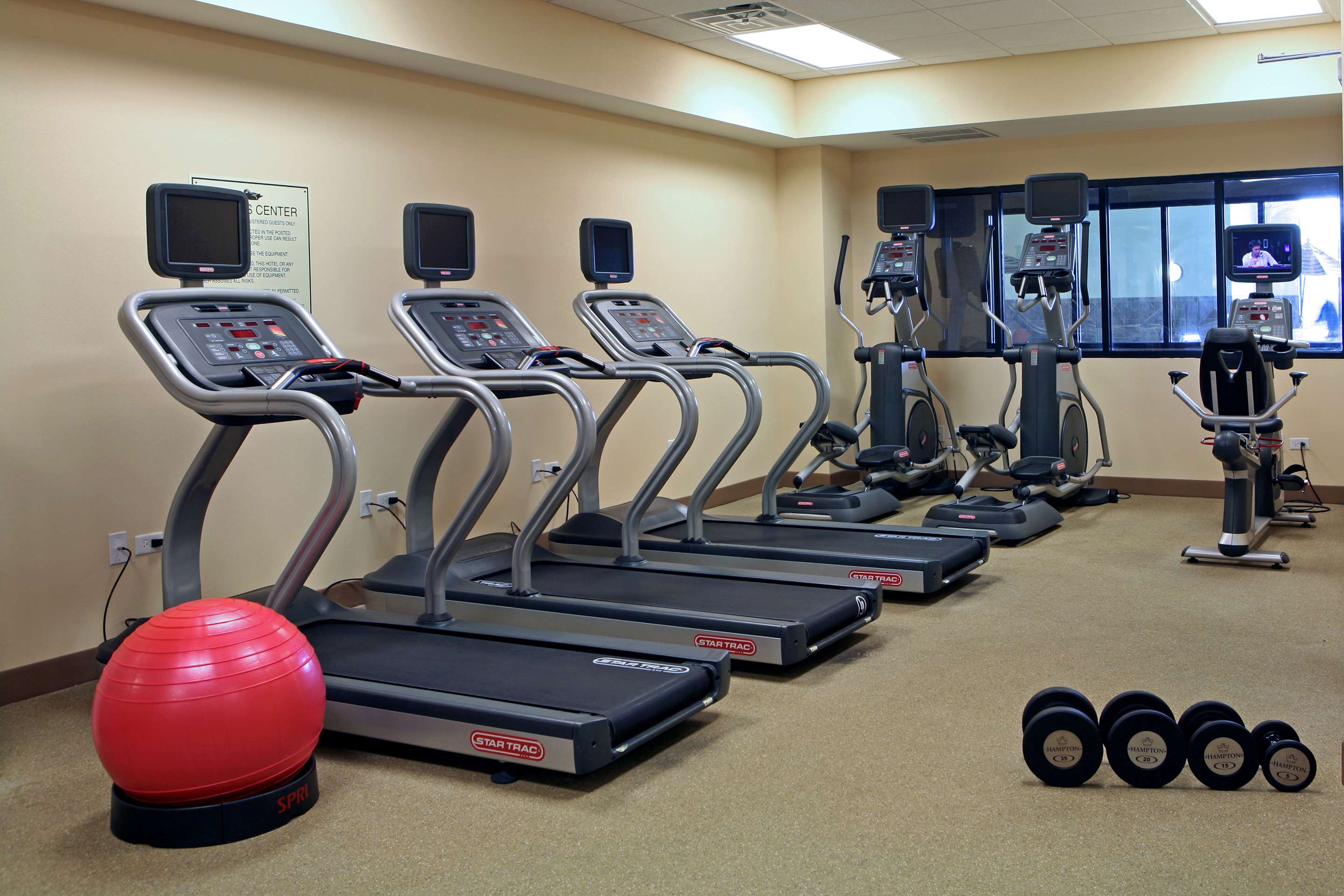 Health club fitness center gym | Homewood Suites by Hilton Coralville - Iowa River Landing