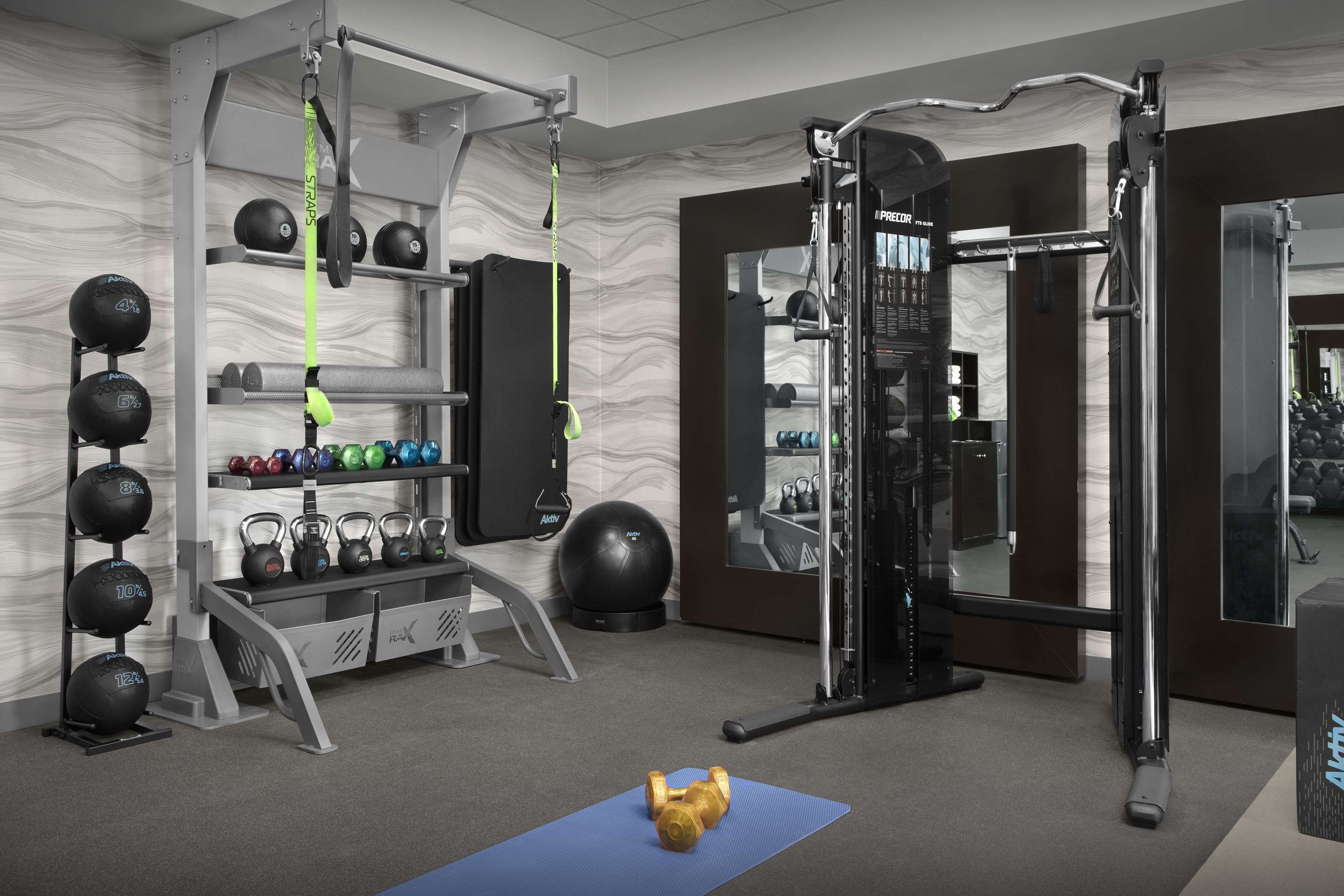 Health club fitness center gym | Homewood Suites by Hilton Orlando Airport