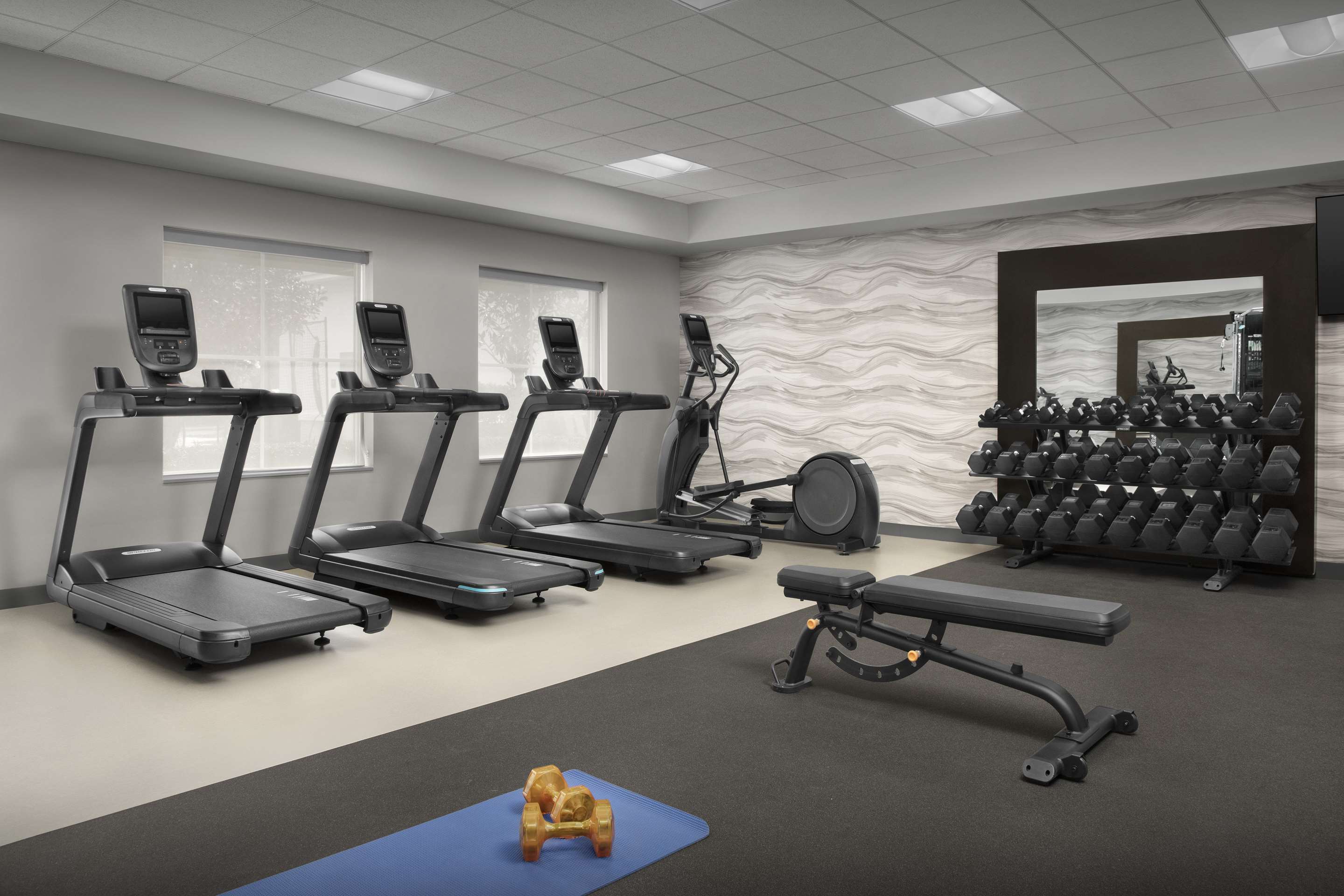 Health club fitness center gym | Homewood Suites by Hilton Orlando Airport