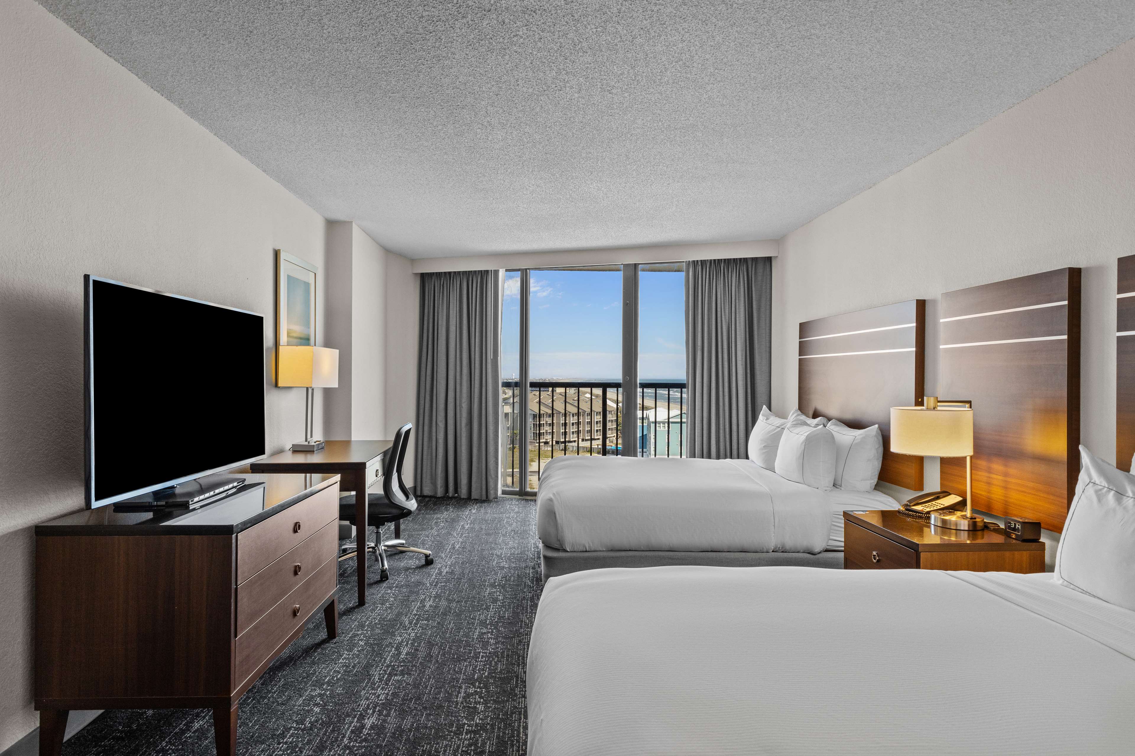 DoubleTree by Hilton Atlantic Beach Oceanfront - Tap to explore photos