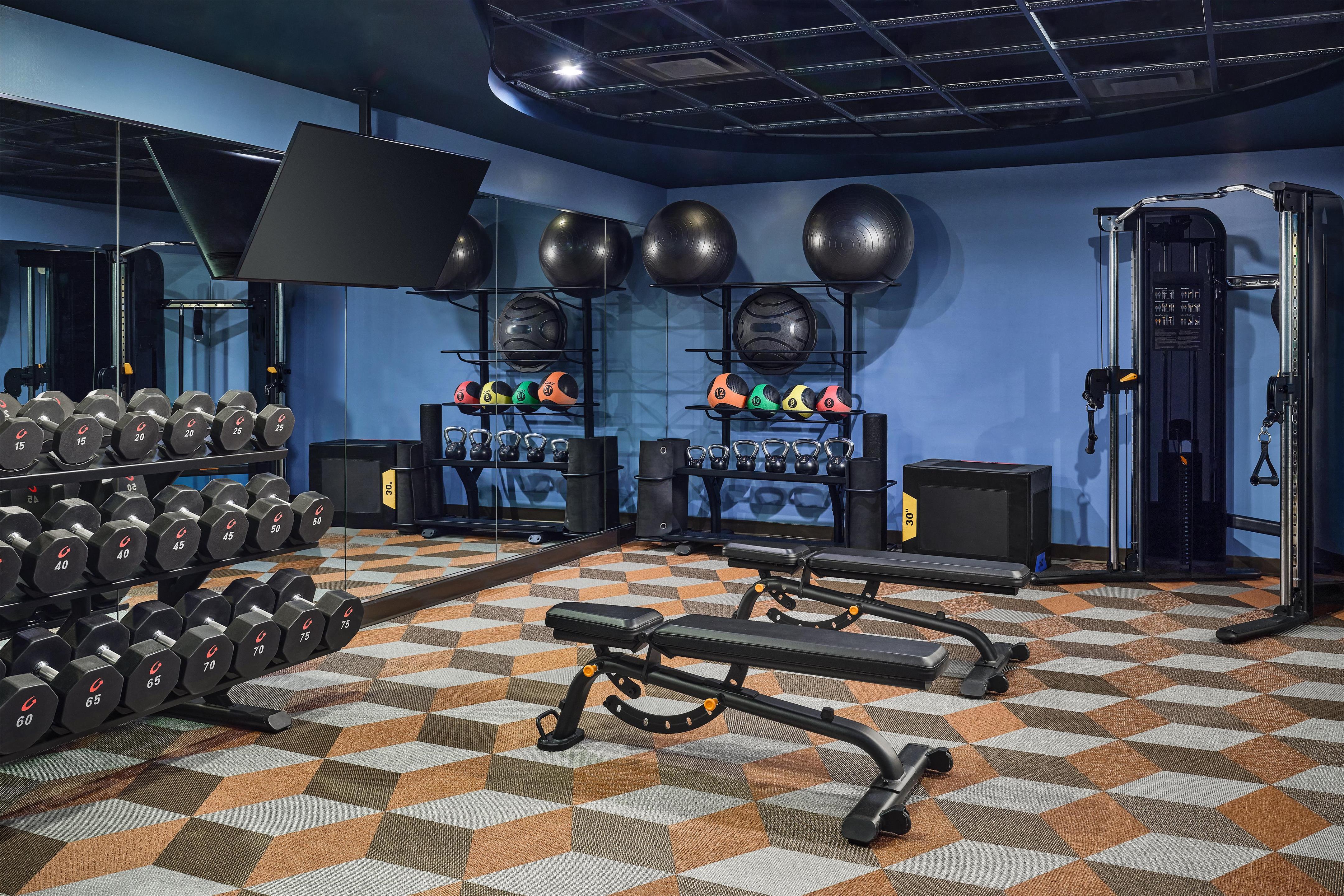 Health club fitness center gym | the Curtis Denver - a DoubleTree by Hilton Hotel