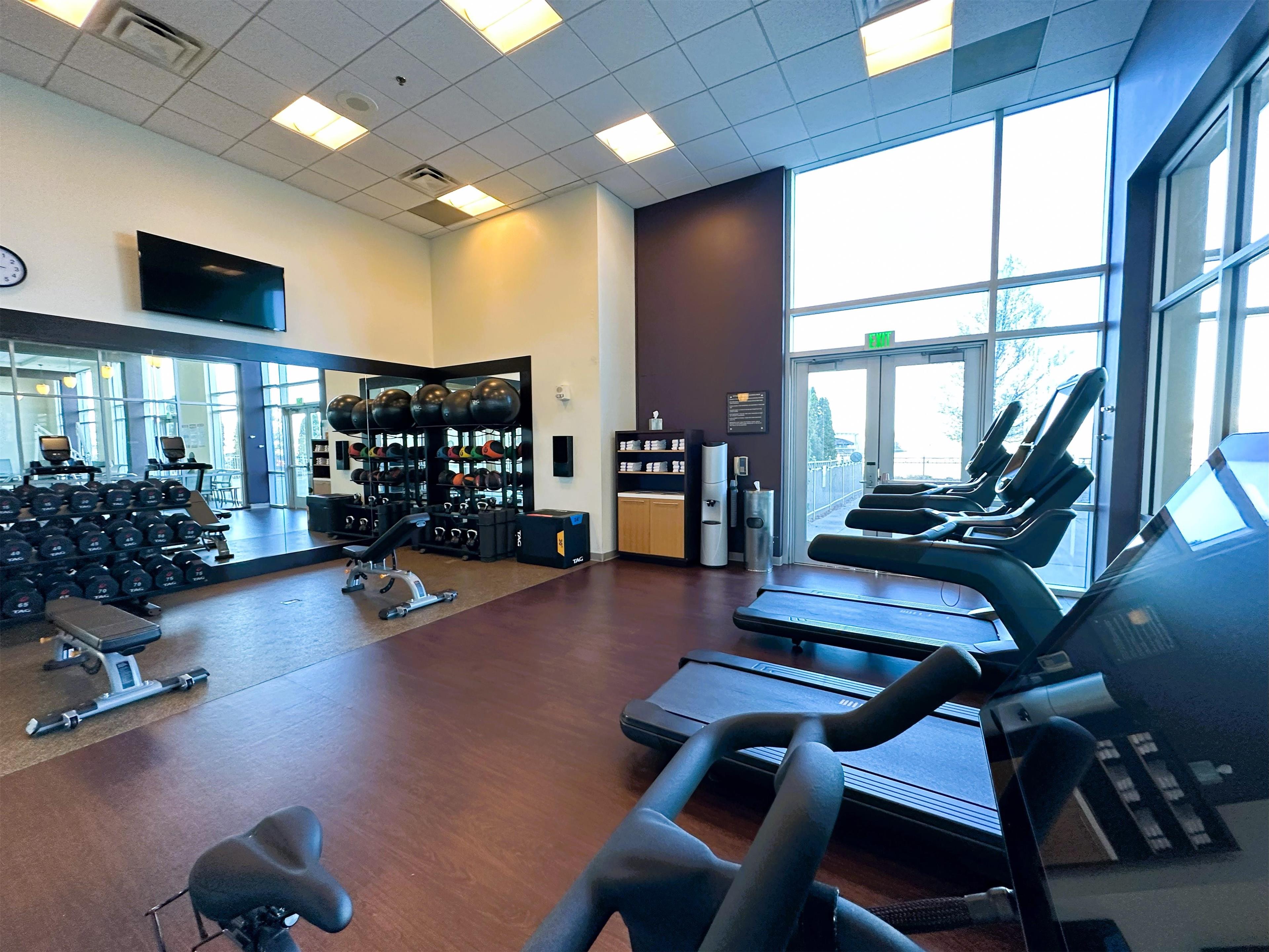Health club fitness center gym | DoubleTree by Hilton Bay City - Riverfront
