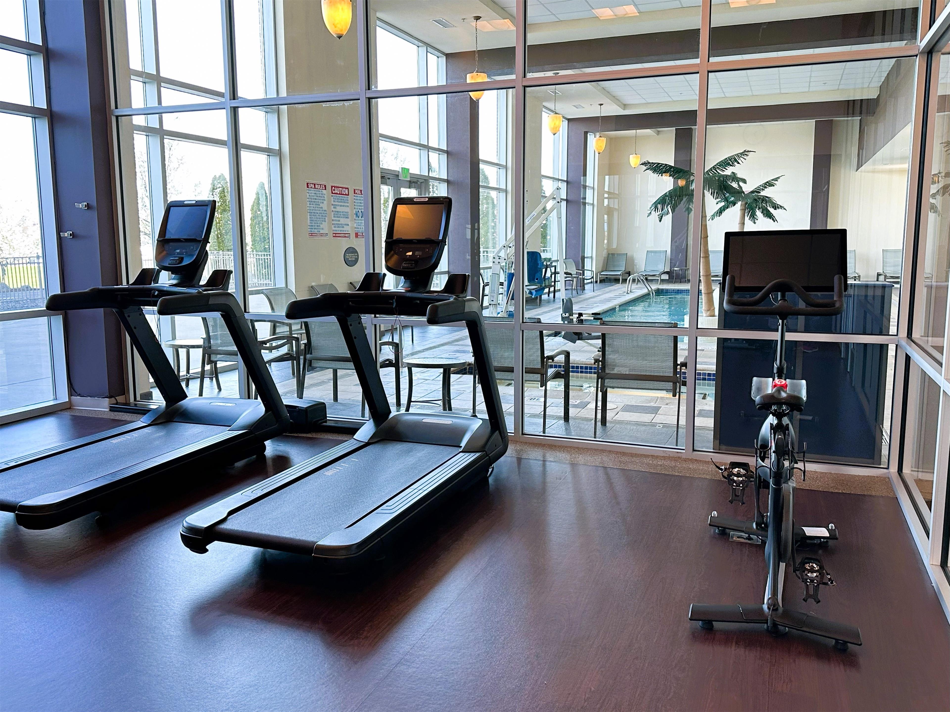 Health club fitness center gym | DoubleTree by Hilton Bay City - Riverfront