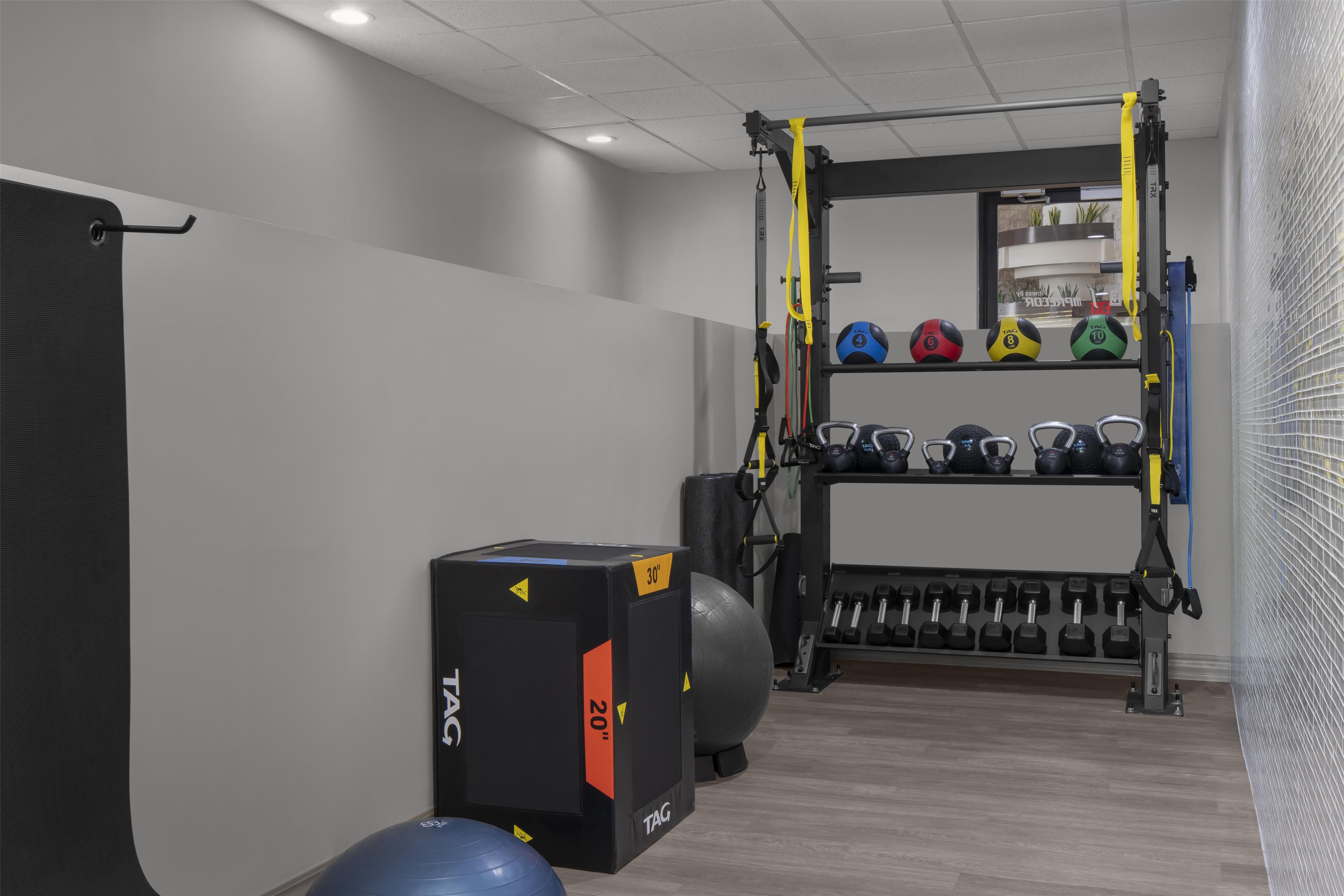 Health club fitness center gym | Embassy Suites by Hilton Orlando International Dr ICON Park