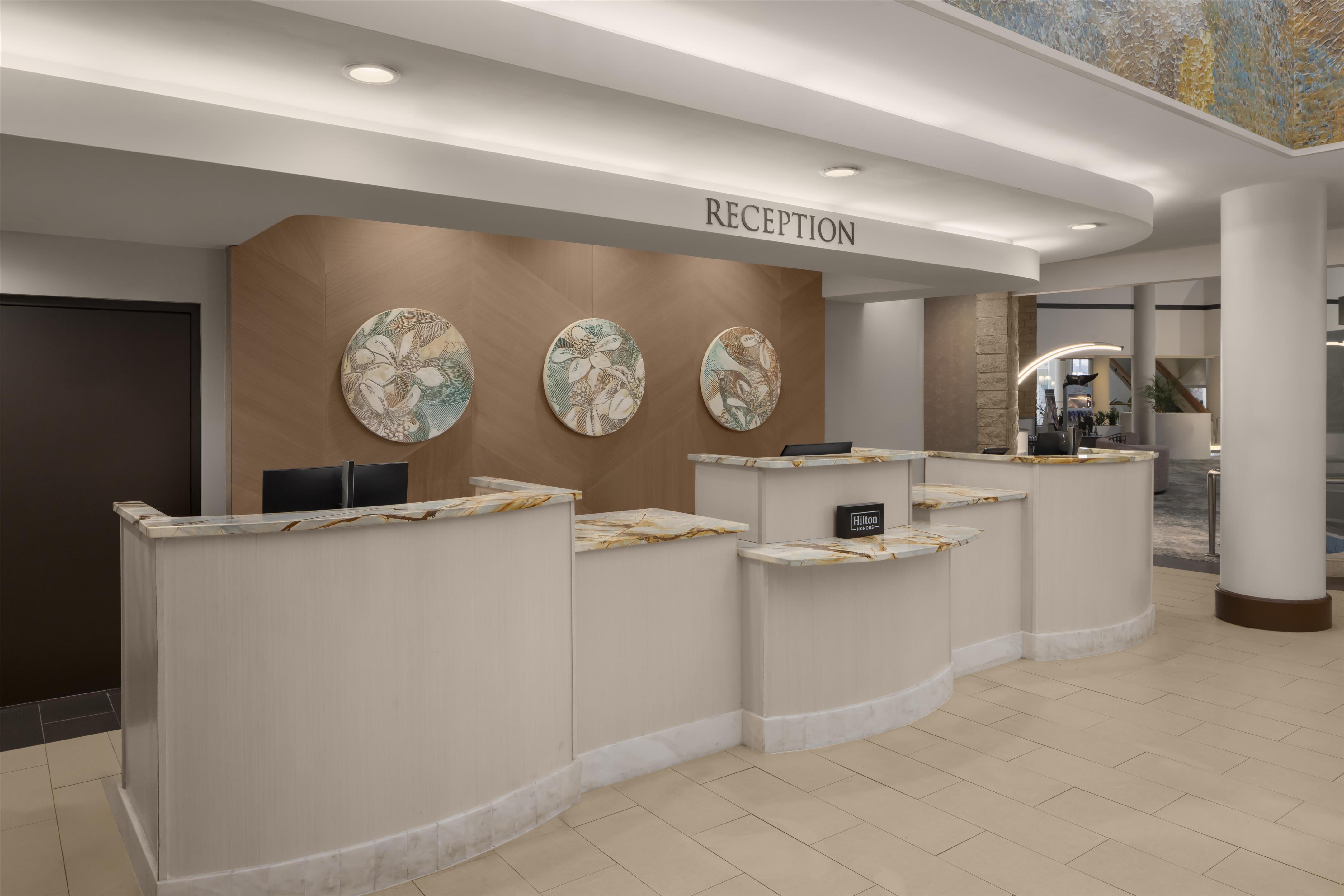 Reception | Embassy Suites by Hilton Orlando International Dr ICON Park