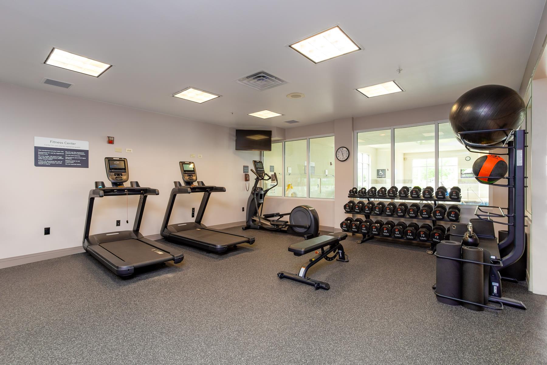Health club fitness center gym | Hilton Garden Inn Milwaukee Northwest Conference Center