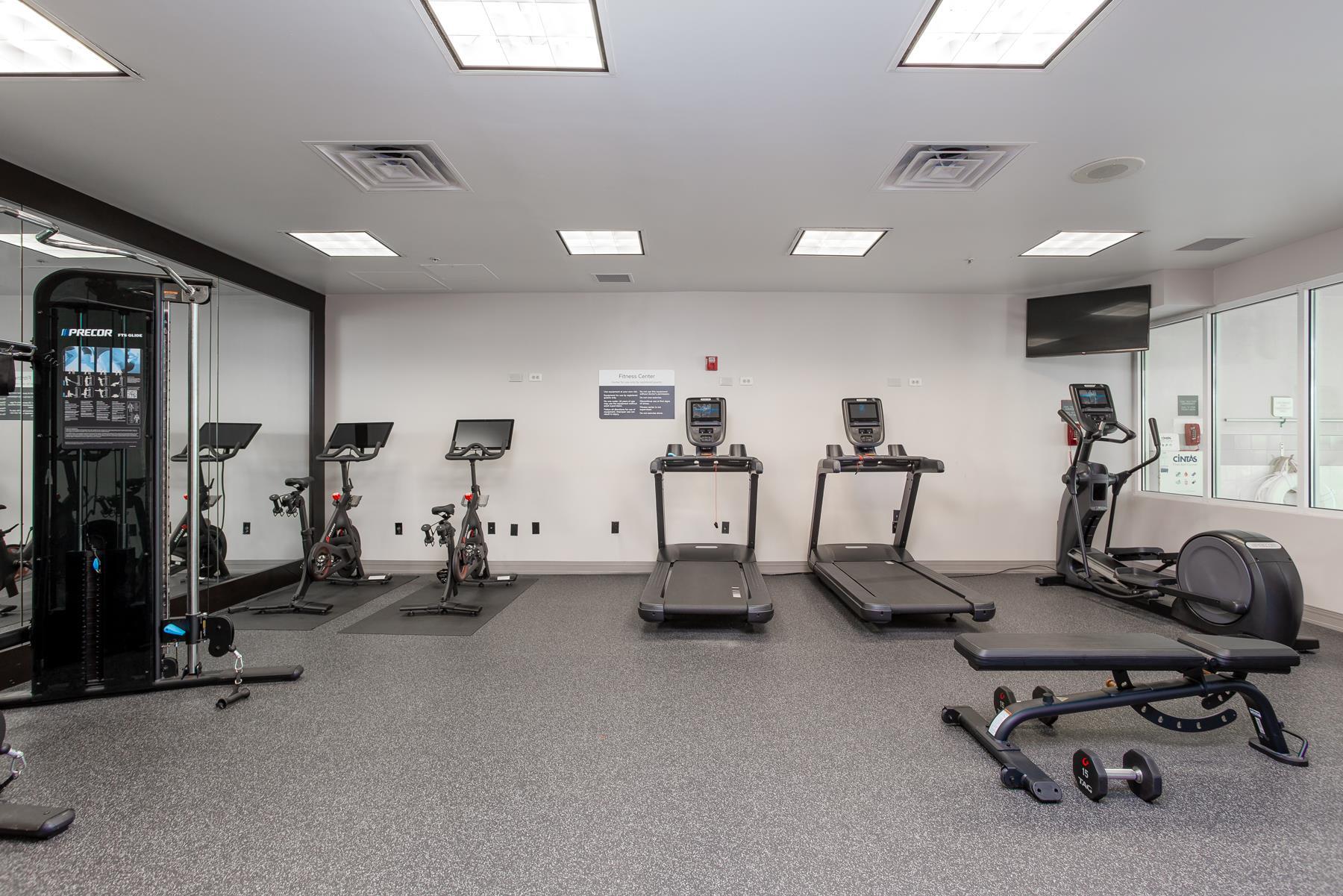 Health club fitness center gym | Hilton Garden Inn Milwaukee Northwest Conference Center