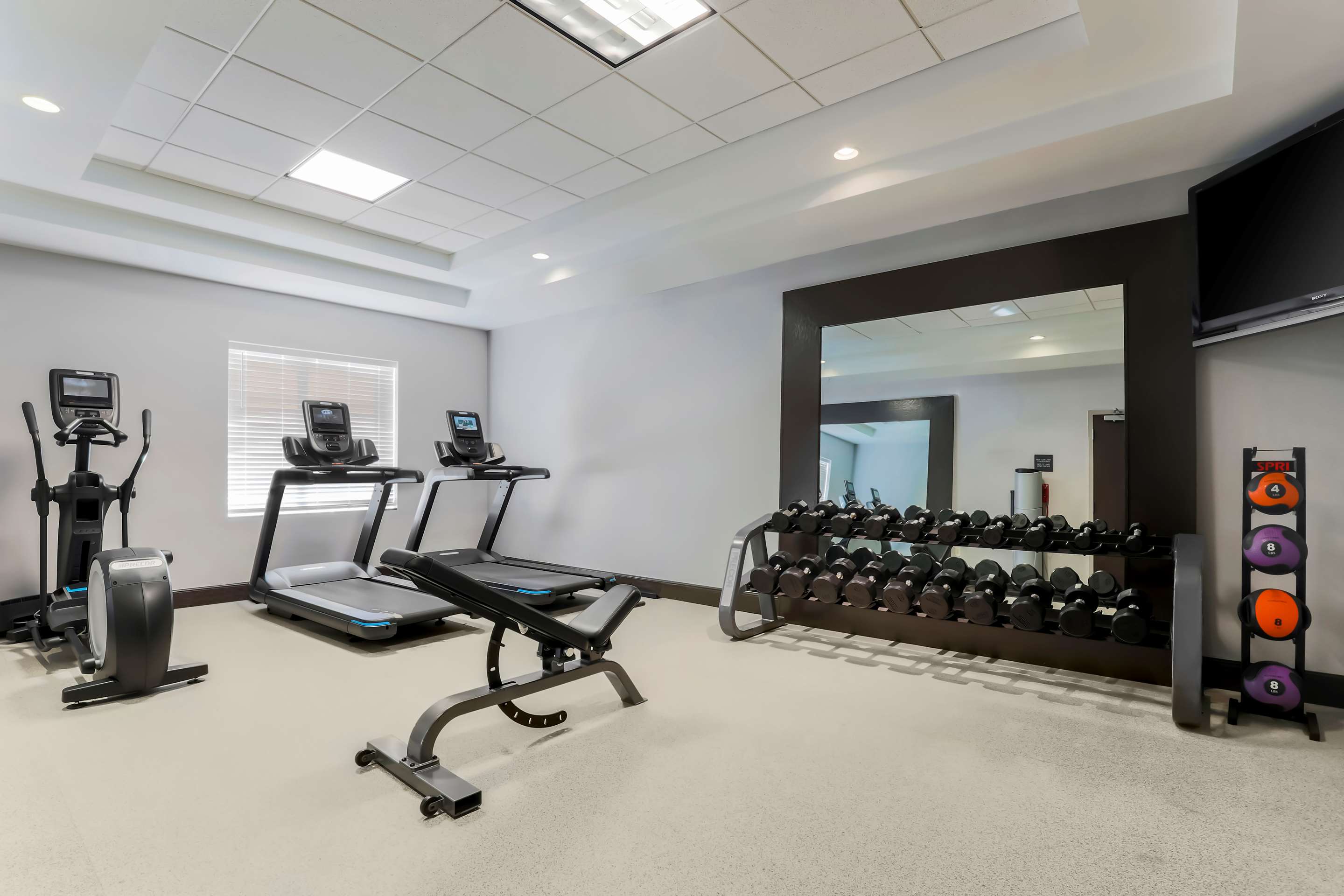 Health club fitness center gym | Hilton Garden Inn Norman