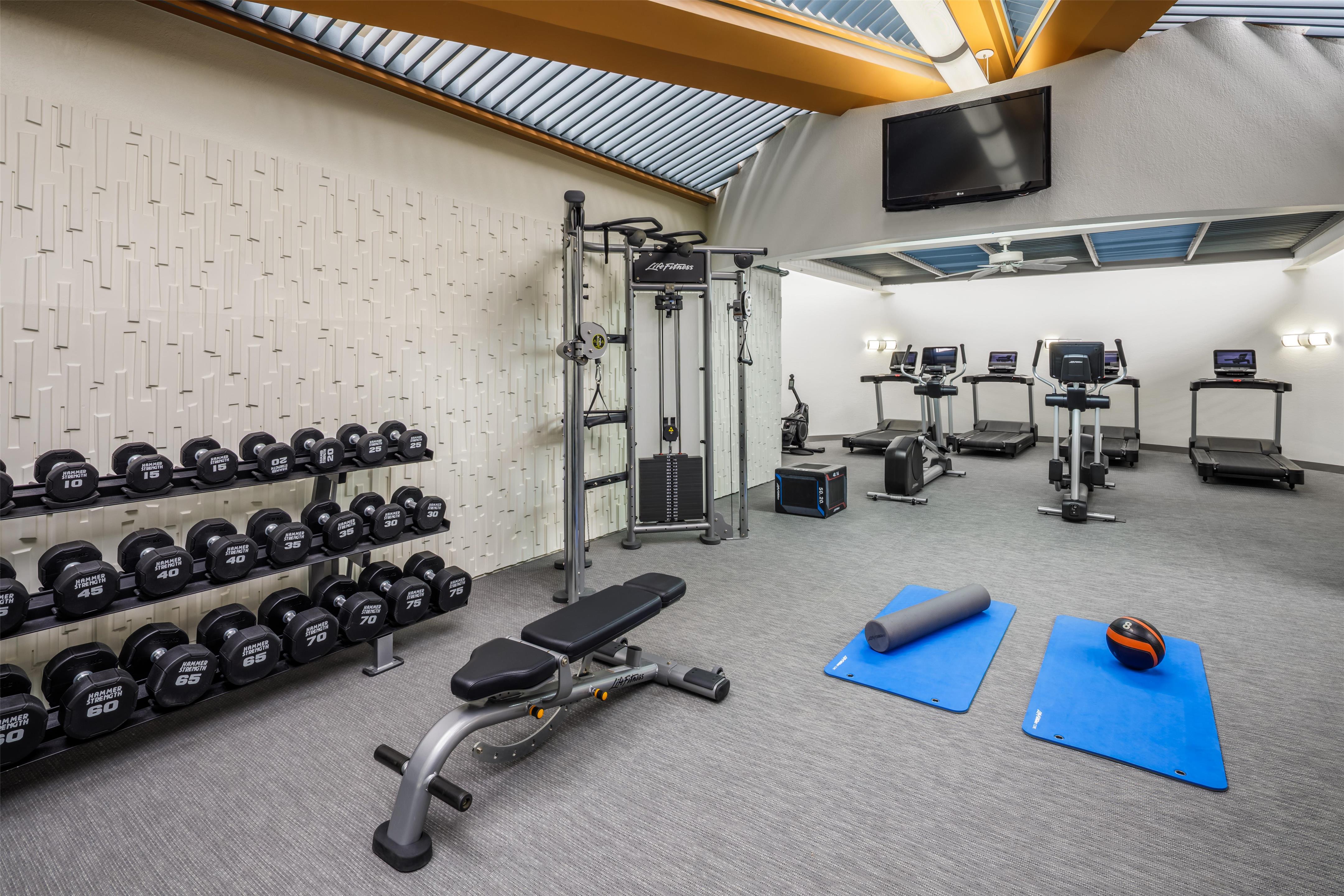 Health club fitness center gym | DoubleTree by Hilton Rochester