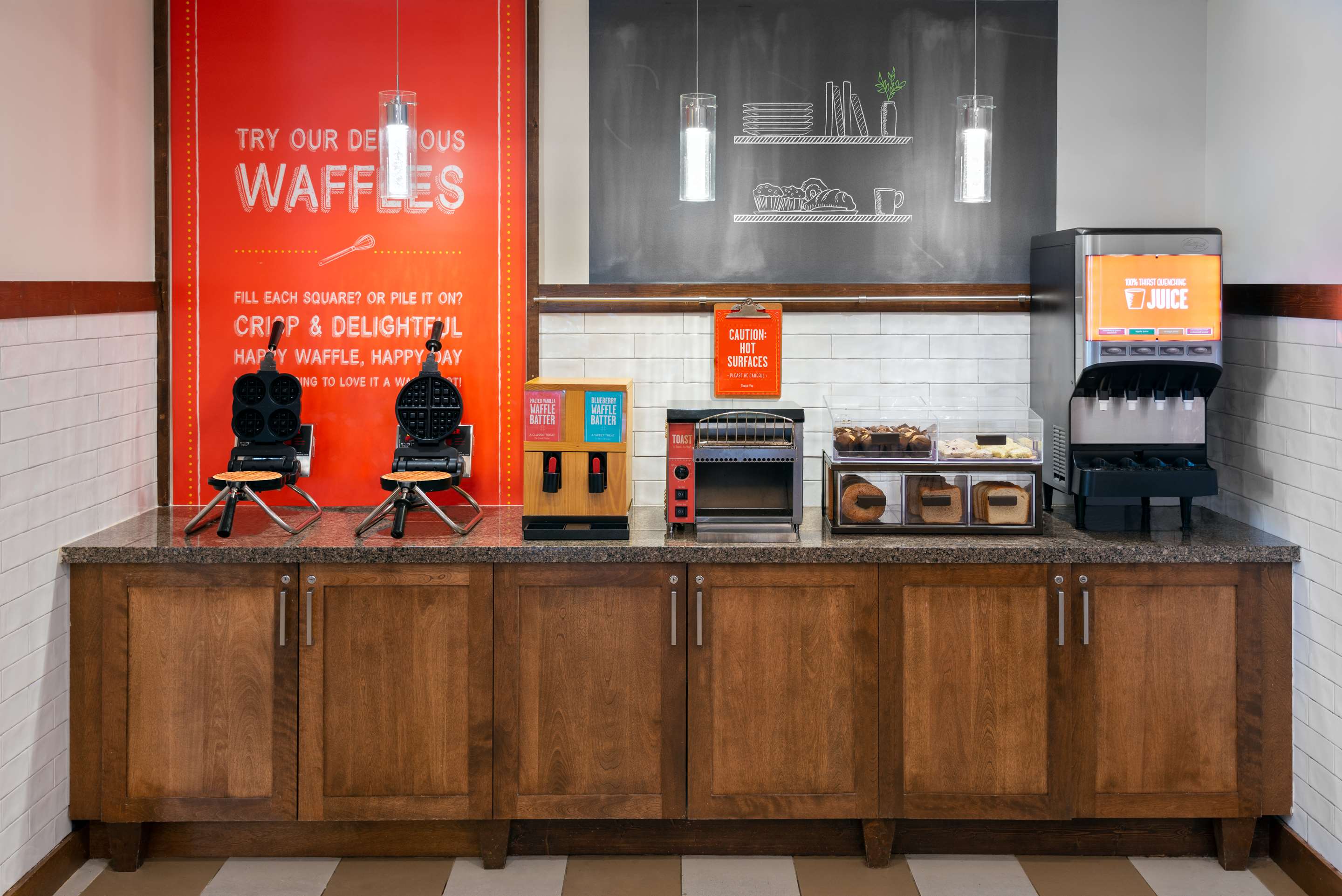 Breakfast Area | Hampton Inn & Suites Clayton/St. Louis-Galleria Area