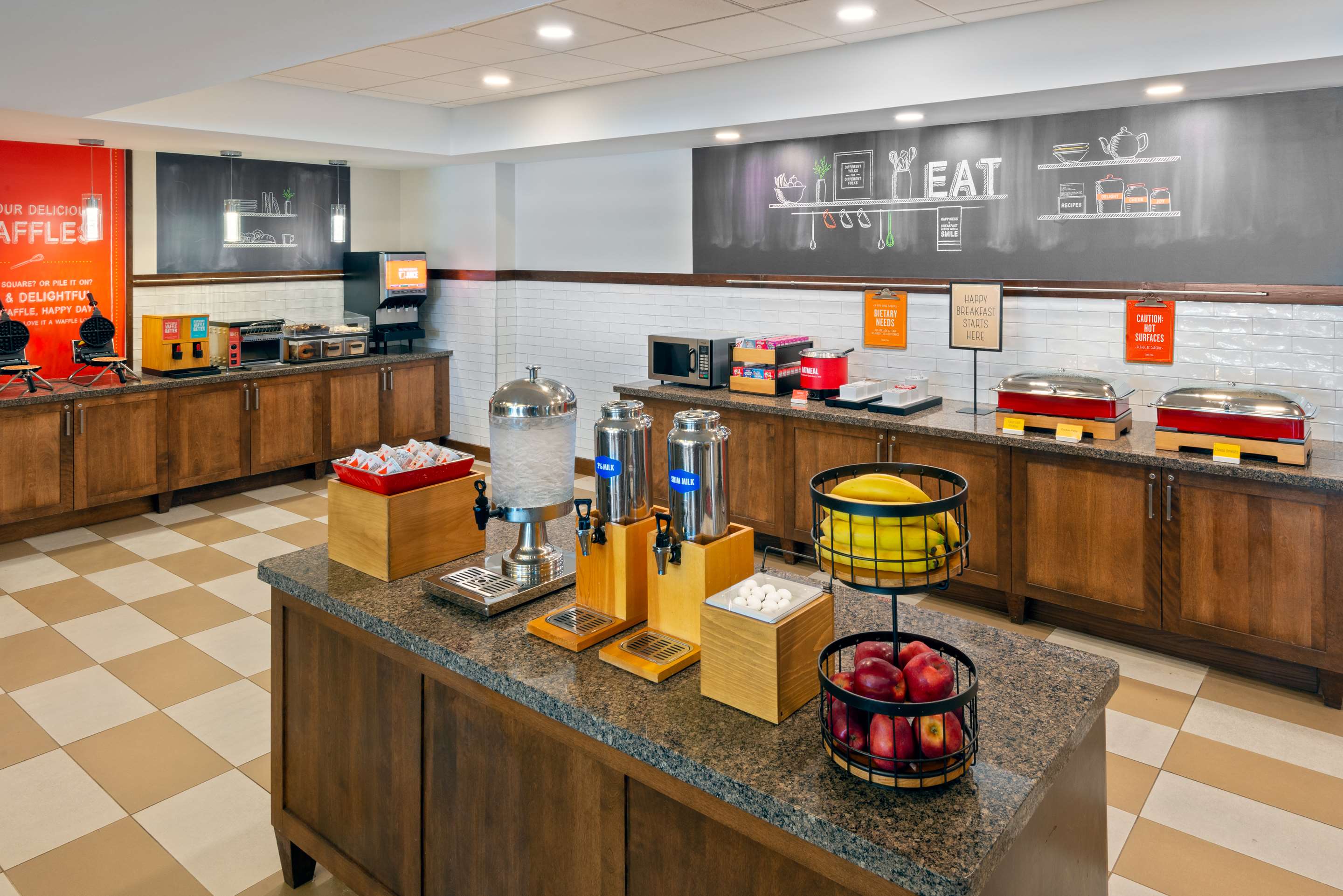 Breakfast Area | Hampton Inn & Suites Clayton/St. Louis-Galleria Area