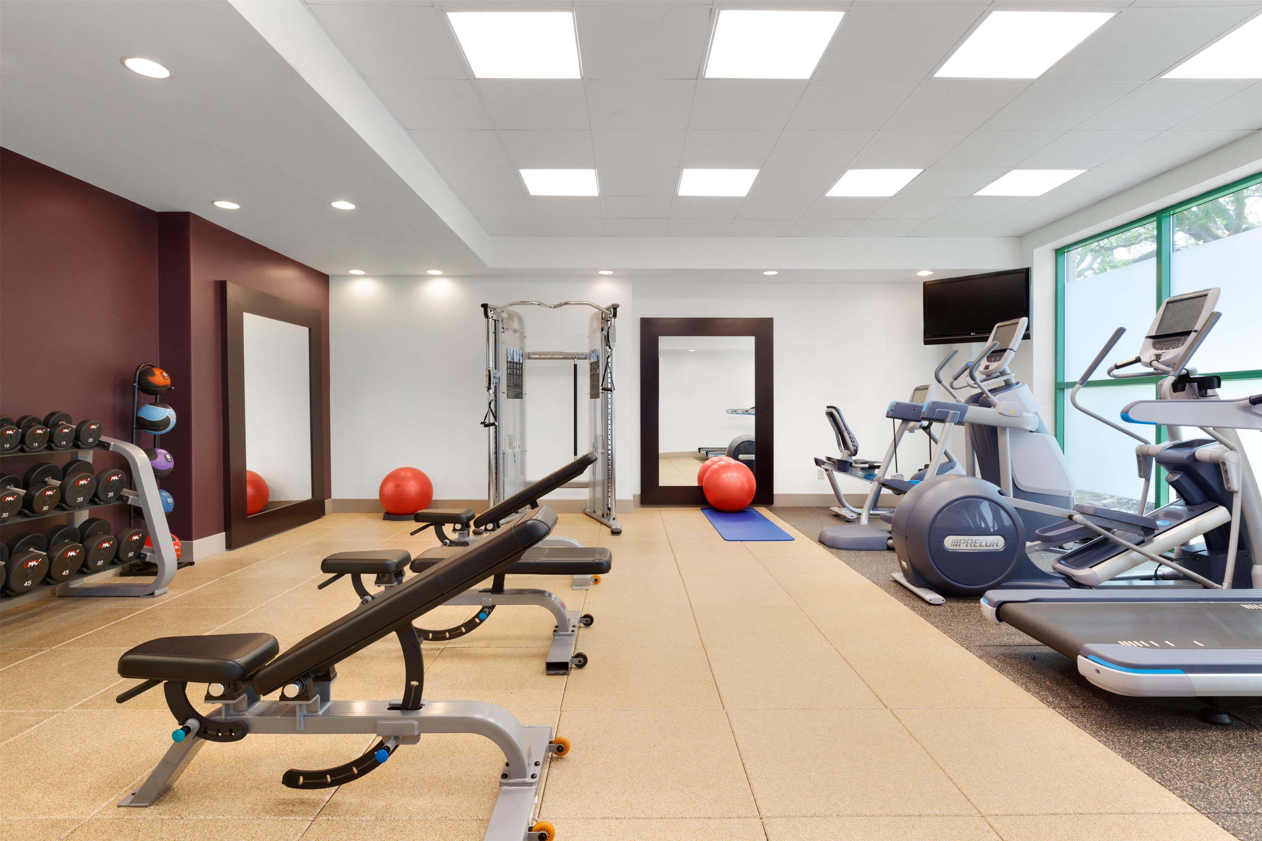 Health club fitness center gym | Embassy Suites by Hilton Tampa USF Near Busch Gardens