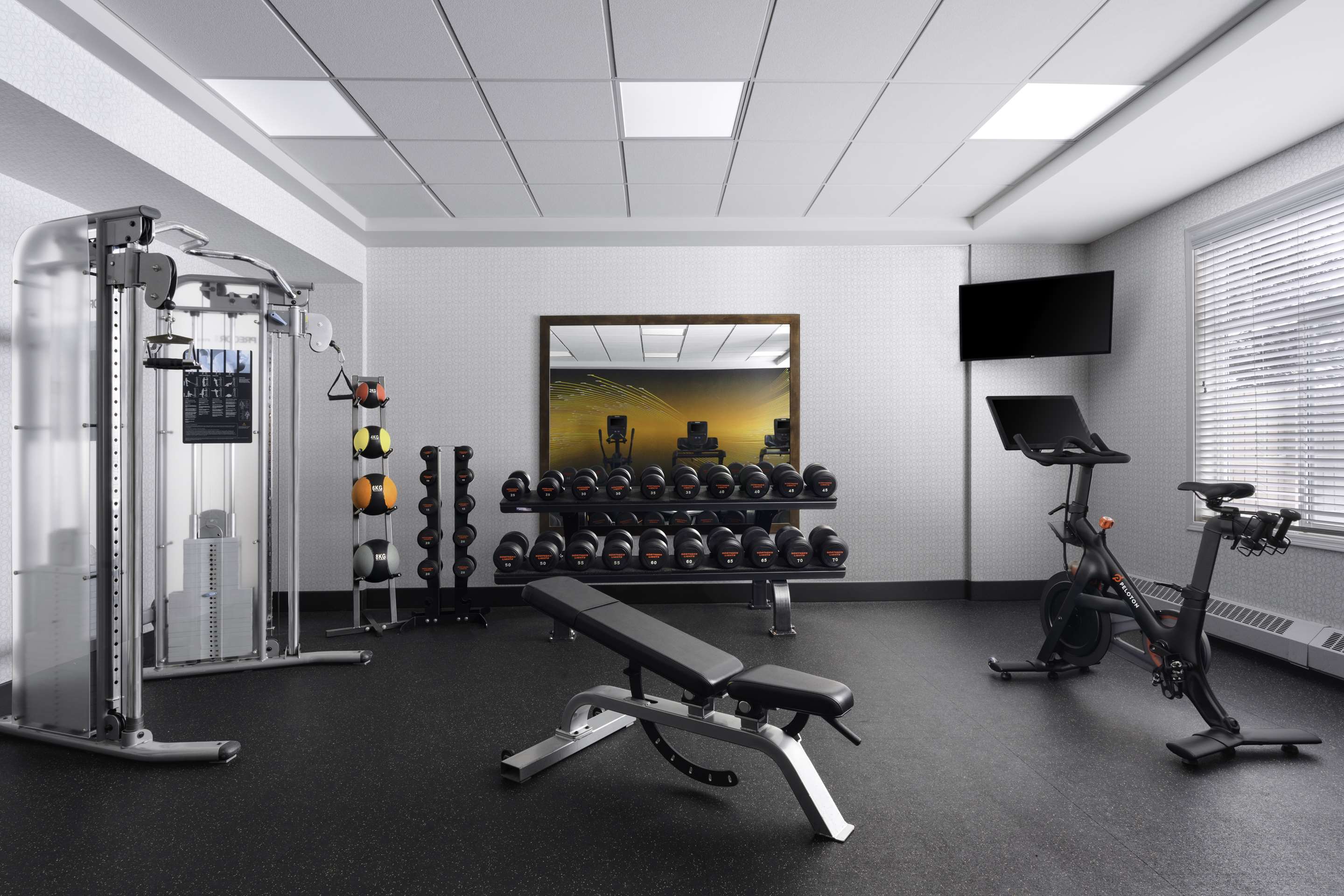 Health club fitness center gym | Hilton Garden Inn Calgary Airport