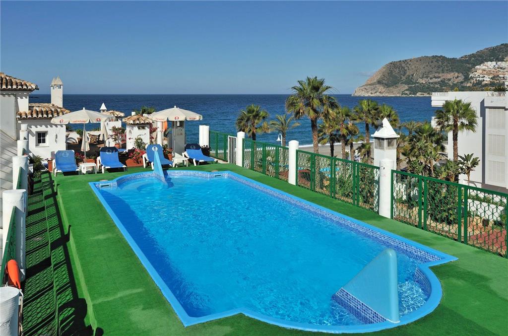 OGDISINI-guestroom-Guest Room,Guest Room Amenity,Pool,Architecture,On-Site,Outdoor/Exterior,Exterior View of Building,Family.jpg