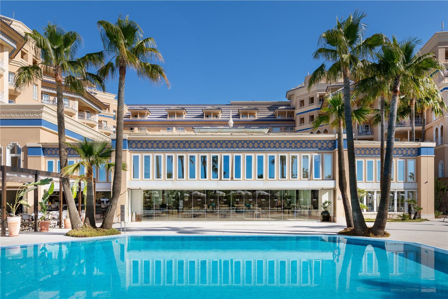 MELIA ISLA CANELA-guestroom-Guest Room,Guest Room Amenity,Pool,Architecture,On-Site,Outdoor/Exterior,People,Waterfront,Exterior View of Building,Family.jpg