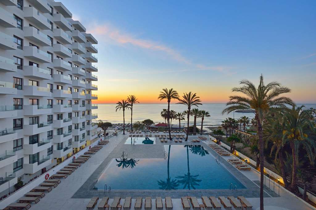 OCEAN HOUSE COSTA DEL SOL AFFILIATE-guestroom-Guest Room,Guest Room Amenity,Pool,Architecture,On-Site,Outdoor/Exterior,City,People,Exterior View of Building,Family.jpg