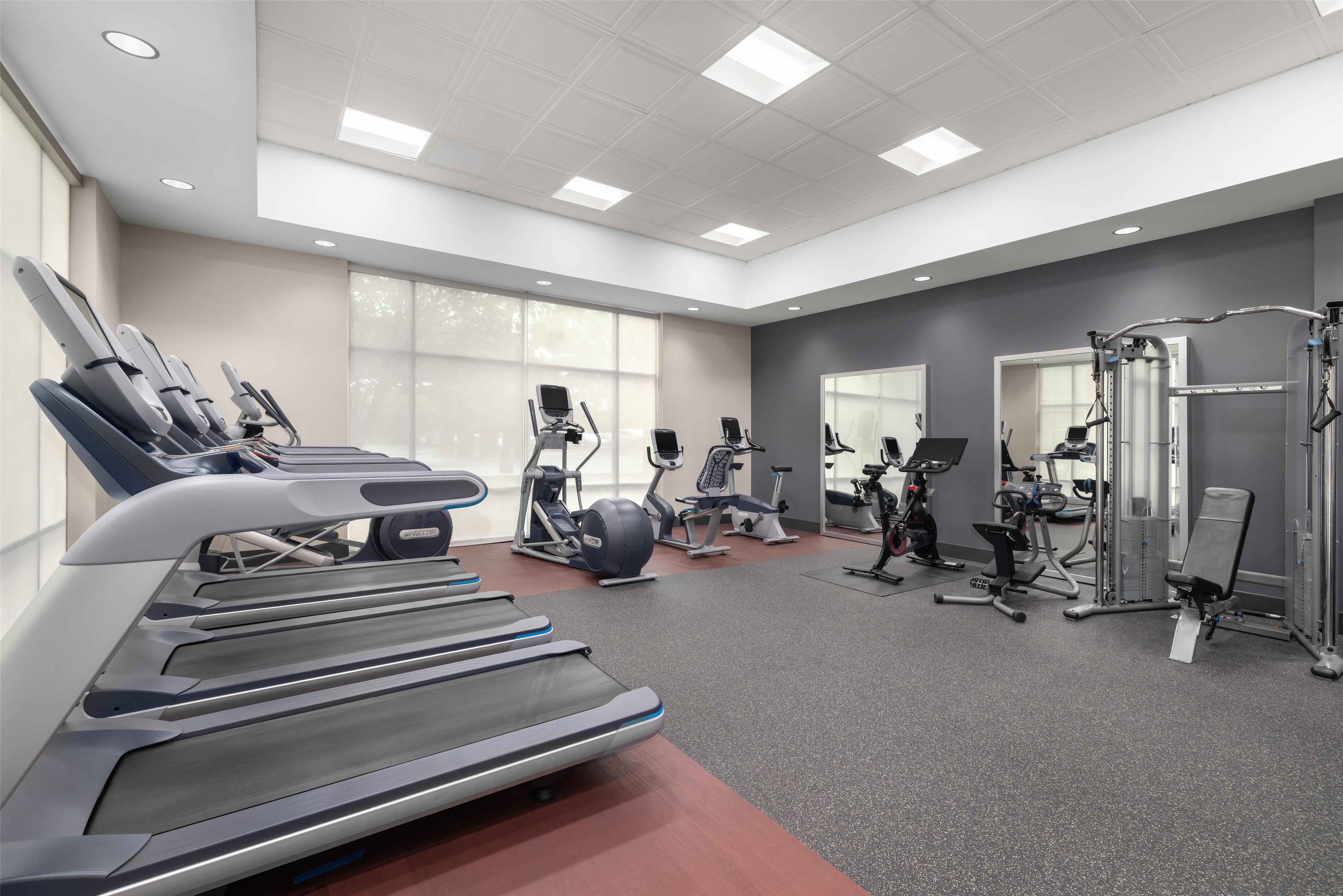 Health club fitness center gym | Embassy Suites by Hilton Charlotte Ayrsley