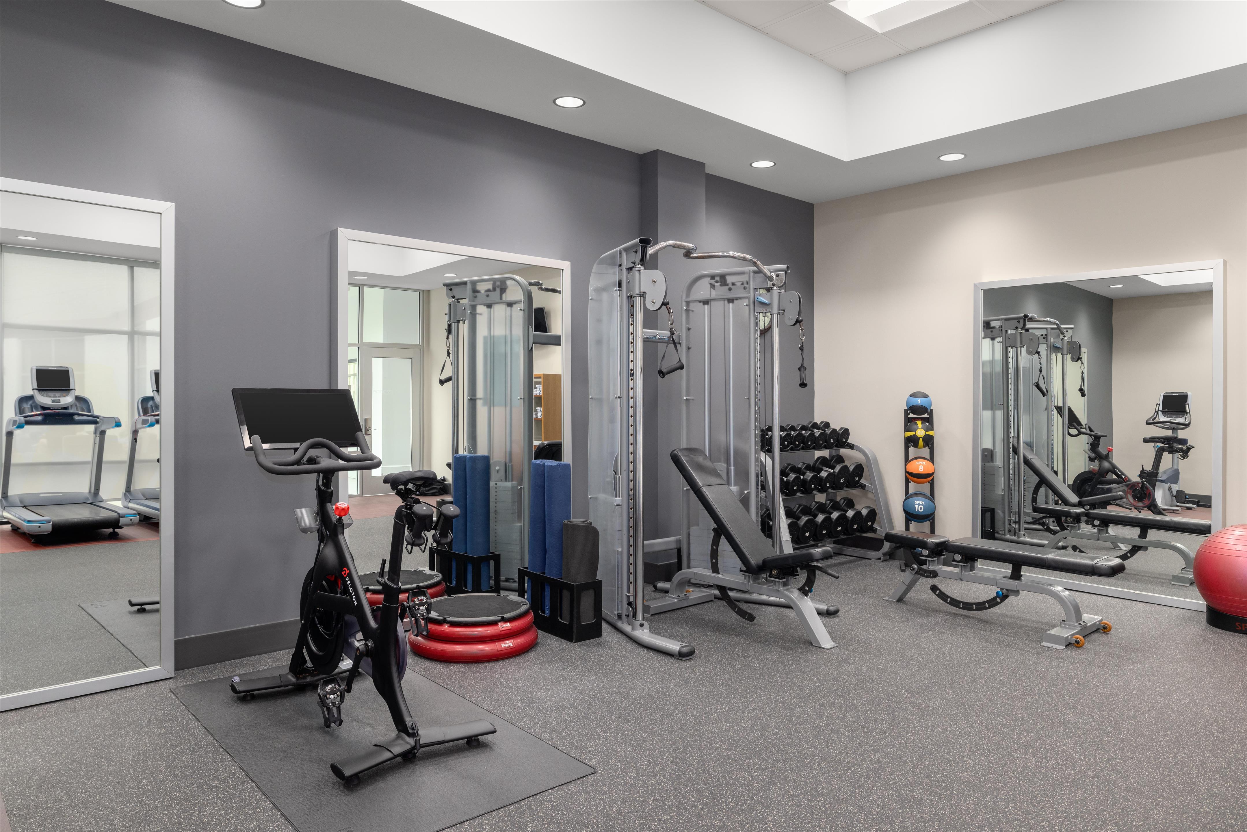 Health club fitness center gym | Embassy Suites by Hilton Charlotte Ayrsley
