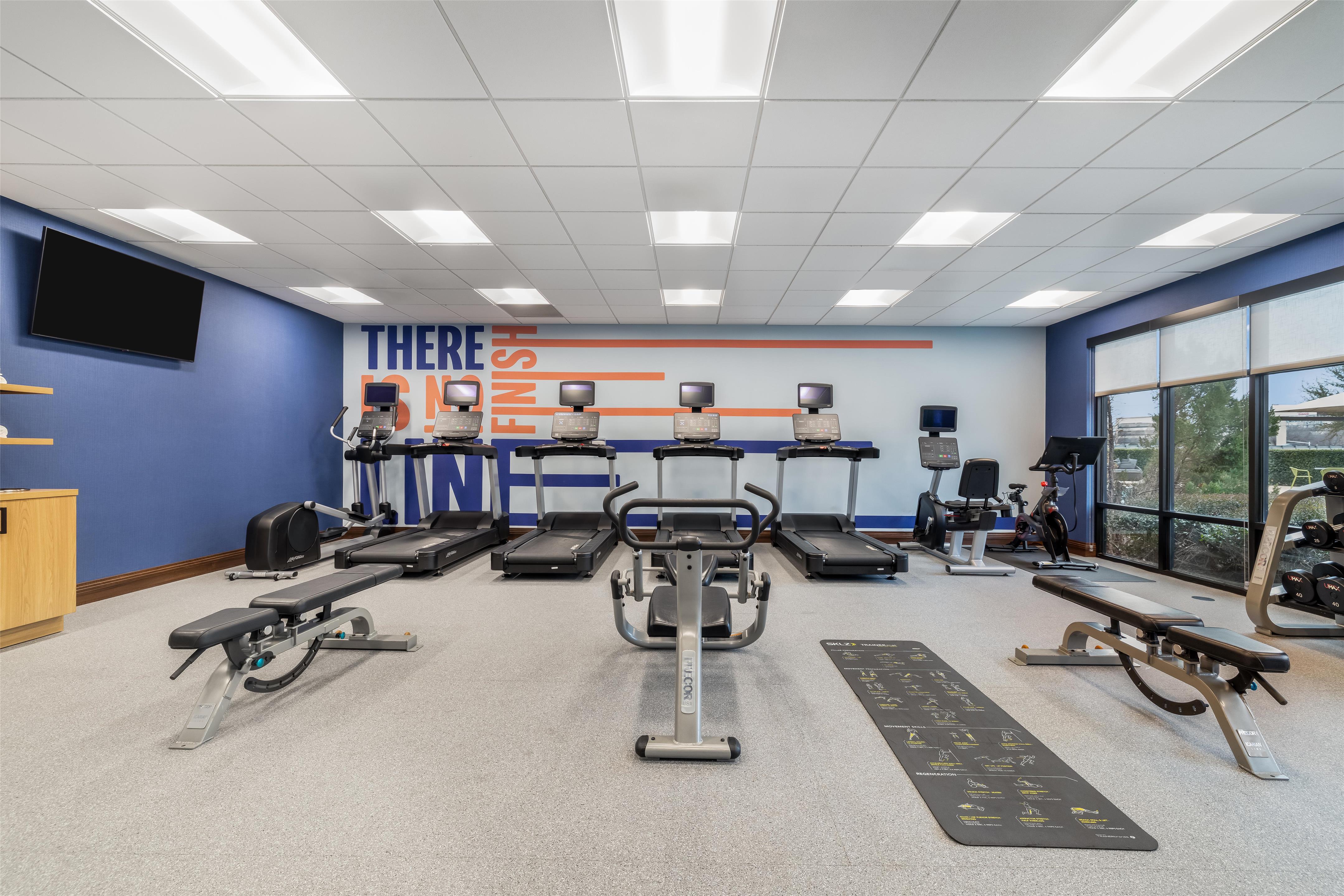 Health club fitness center gym | Hampton Inn & Suites Dallas/Plano-East