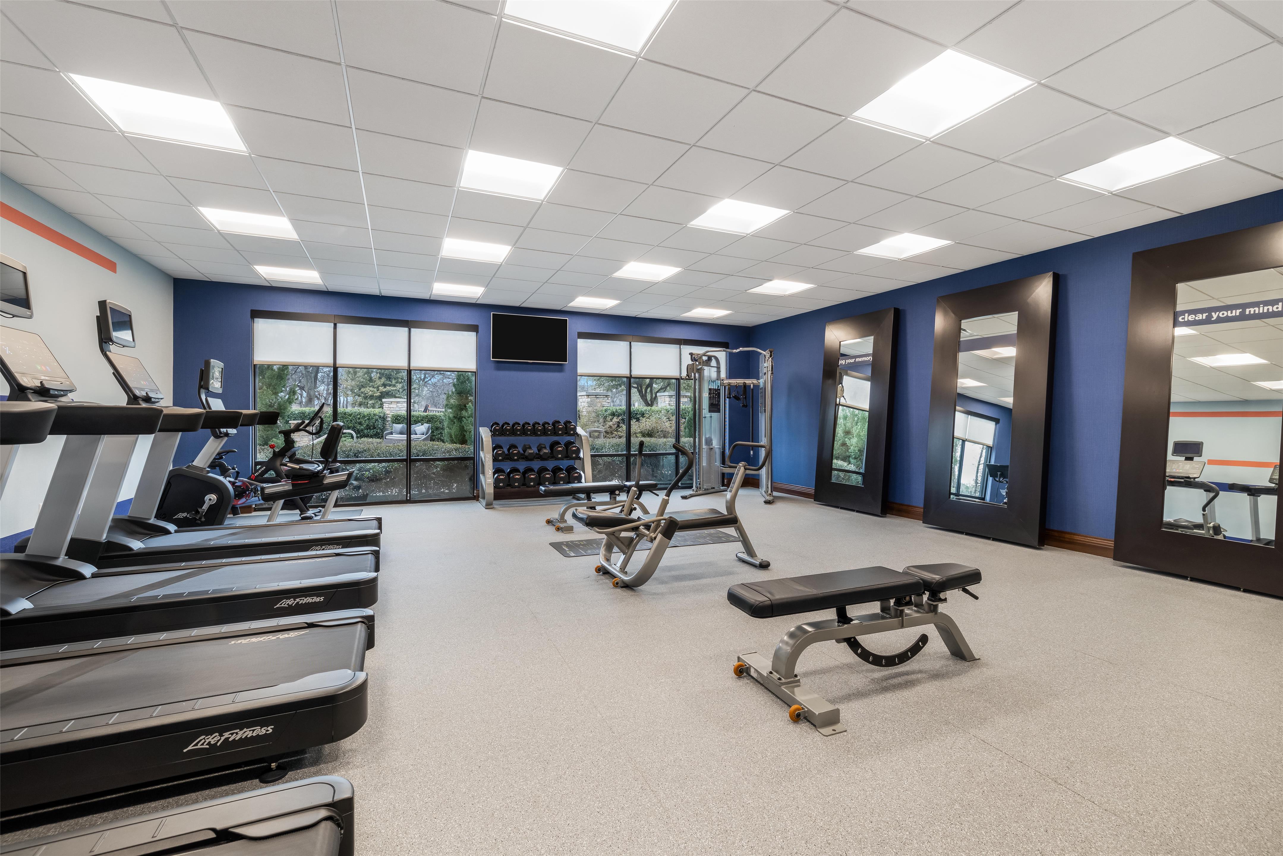 Health club fitness center gym | Hampton Inn & Suites Dallas/Plano-East