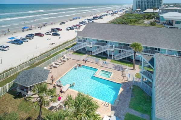 Beach - New Smyrna Waves Resort by Exploria