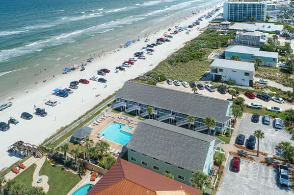 Beach - New Smyrna Waves Resort by Exploria