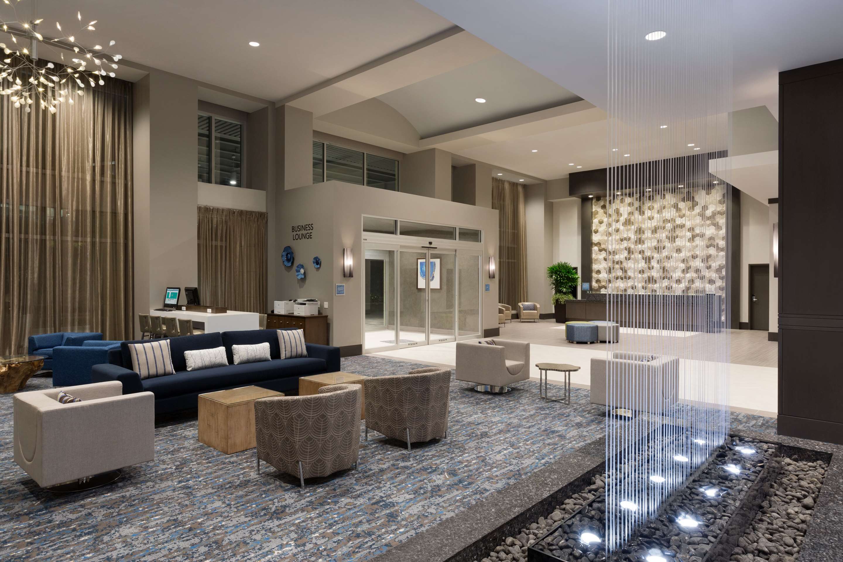 Reception | Embassy Suites by Hilton The Woodlands at Hughes Landing