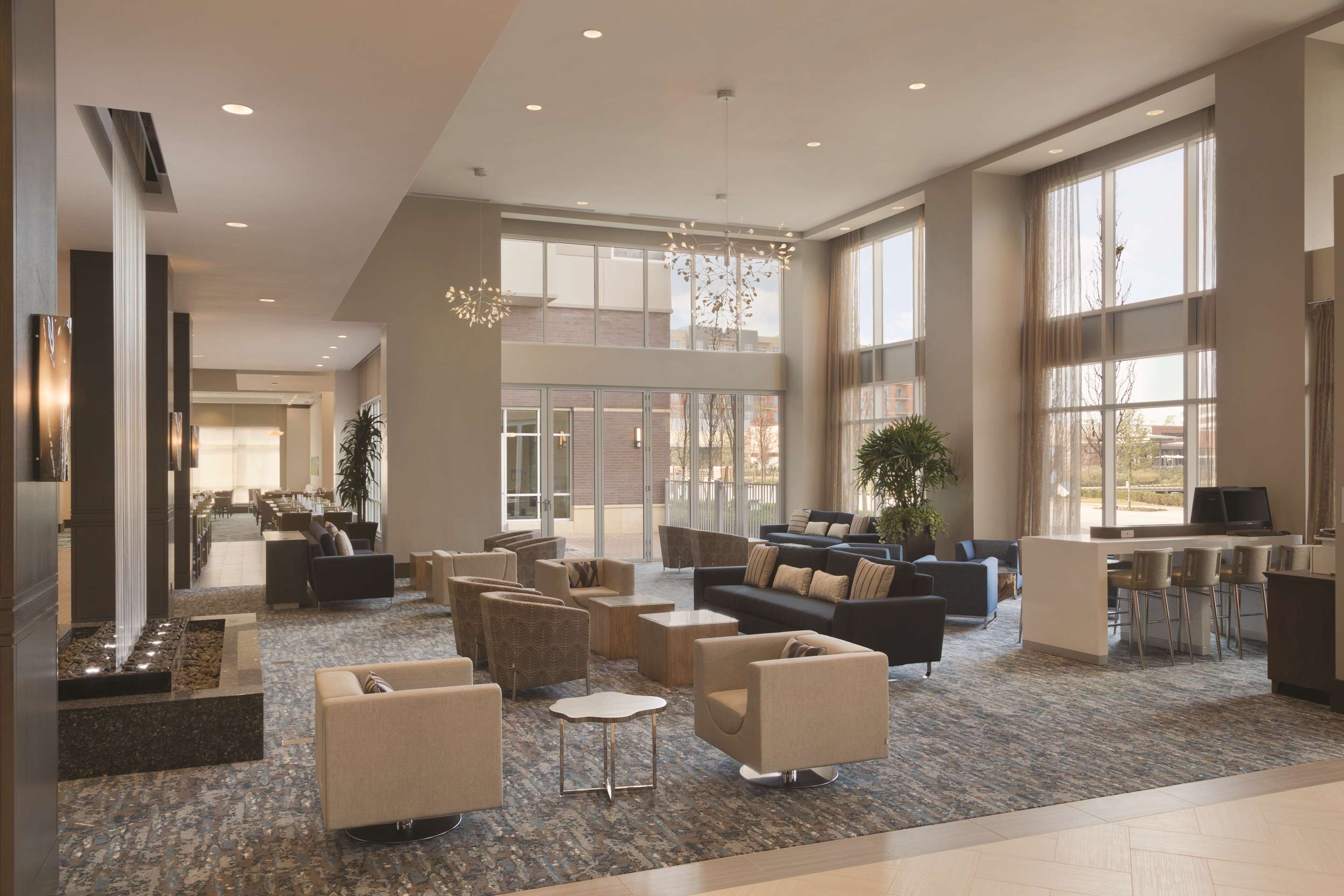 Lobby | Embassy Suites by Hilton The Woodlands at Hughes Landing