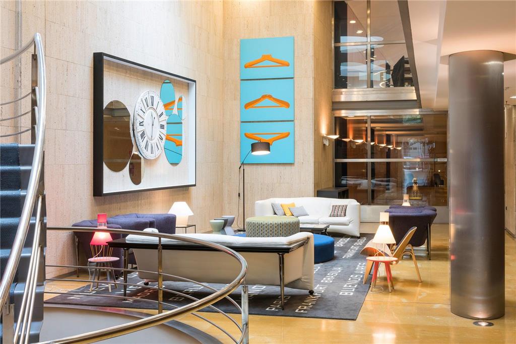 CASTELLON CENTER AFFILIATED BY MHI-guestroom-Guest Room,Living Area,Architecture,Indoor/Interior,On-Site,Décor detail,Summer,View from room,Exterior View of Building.jpg
