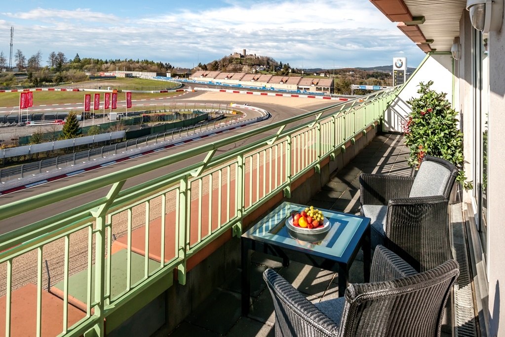 DORINT NUERBURGRING-guestroom-Guest Room,Balcony,Coffee/tea facilities,Mini-Refrigerator,Safe,TV and multimedia,Suite,Indoor/Interior,On-Site,Telephone.jpg
