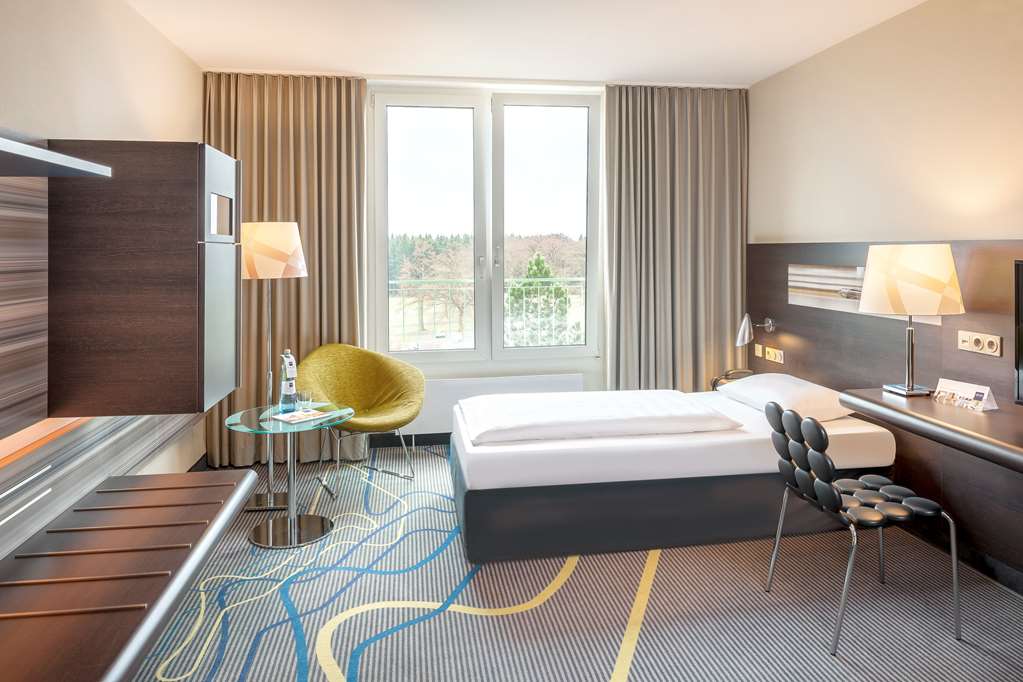 DORINT NUERBURGRING-guestroom-Guest Room,Mini-Refrigerator,TV and multimedia,Indoor/Interior,On-Site,Telephone.jpg