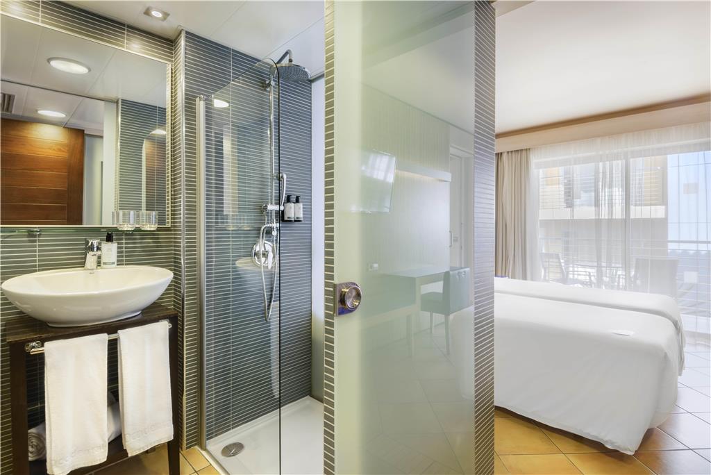 OCCIDENTAL MENORCA-guestroom-Guest Room,Bathroom,On-Site.jpg