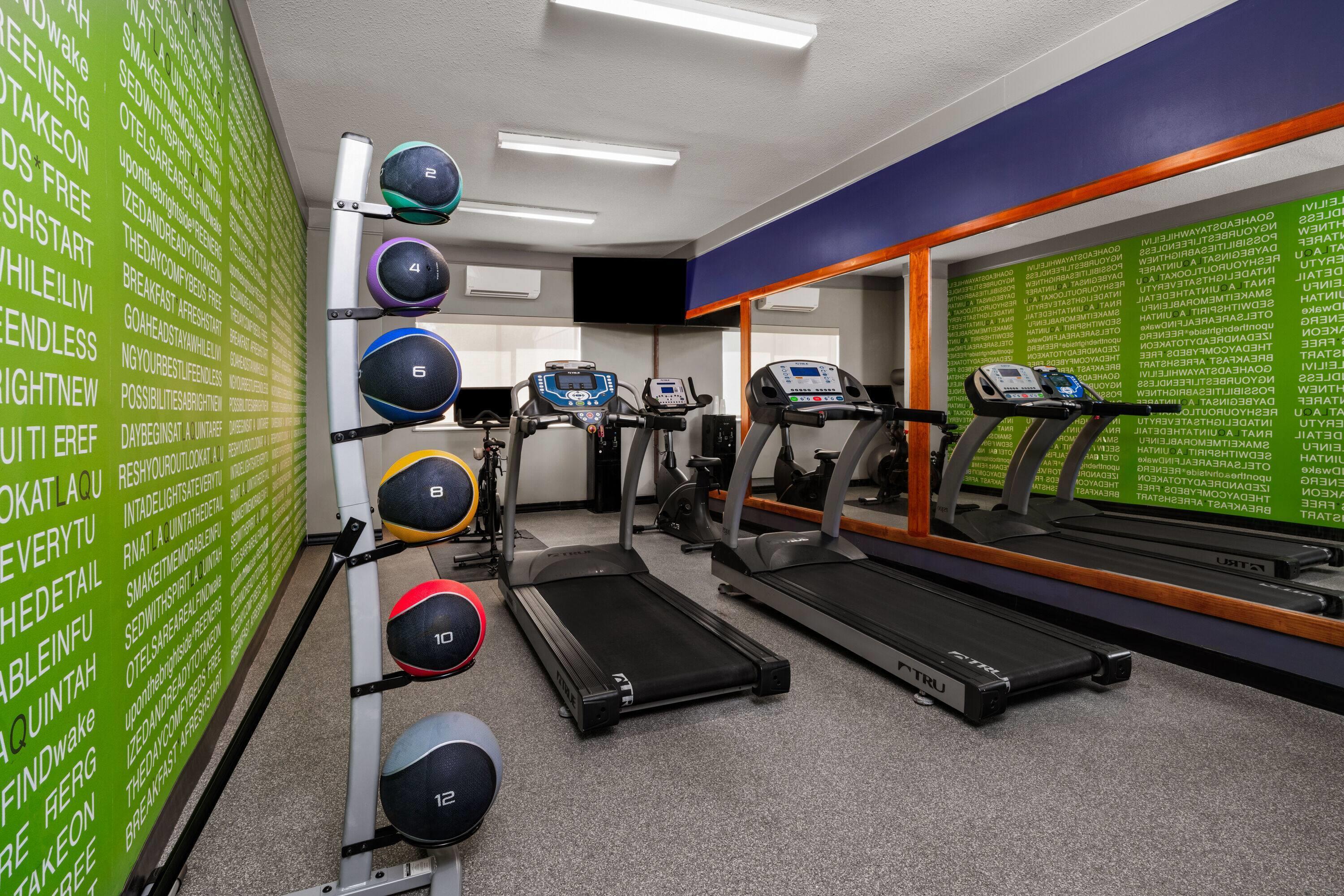 Health club fitness center gym | La Quinta Inn & Suites by Wyndham Jackson Airport/Pearl