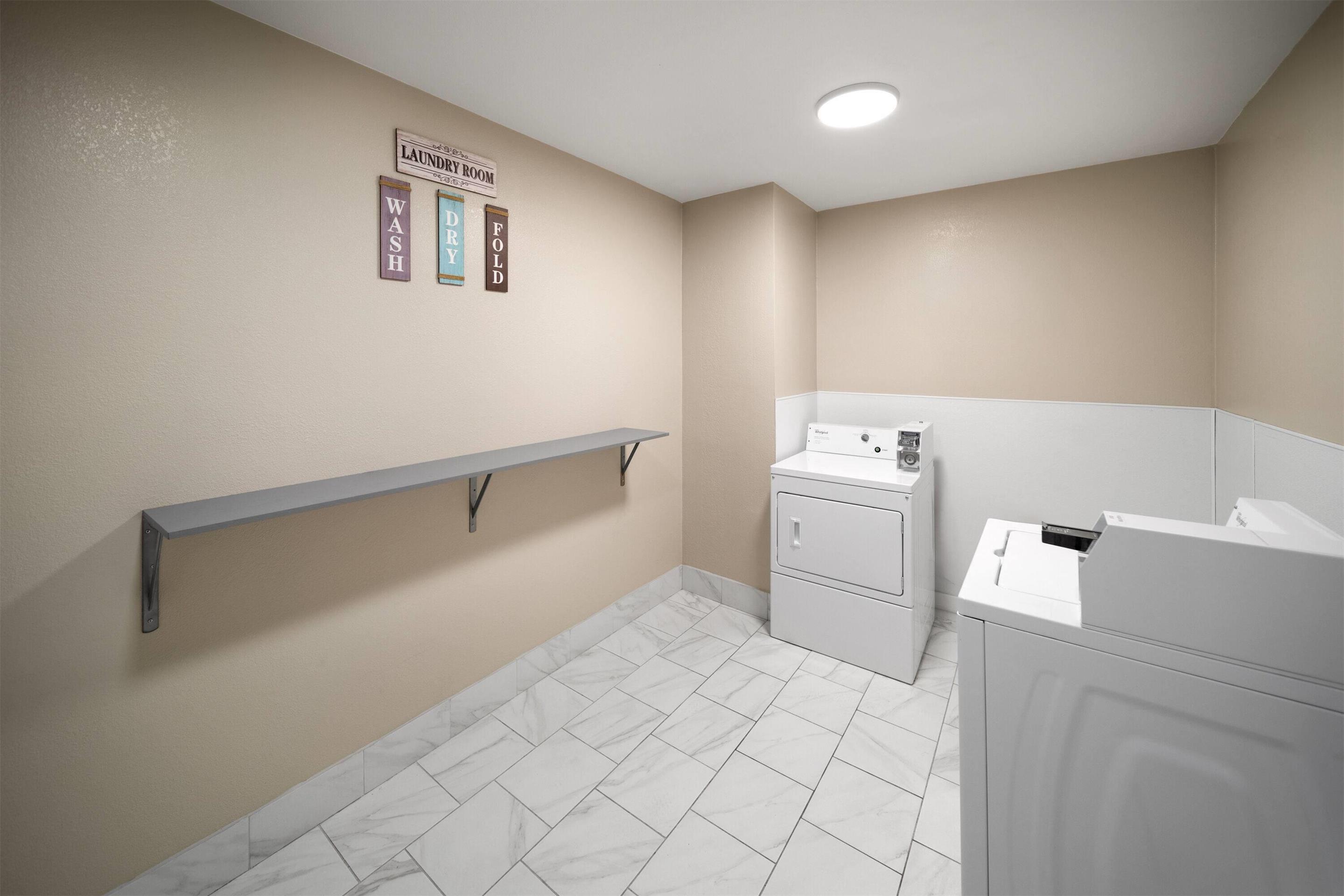 Laundry | La Quinta Inn & Suites by Wyndham Houston Stafford Sugarland