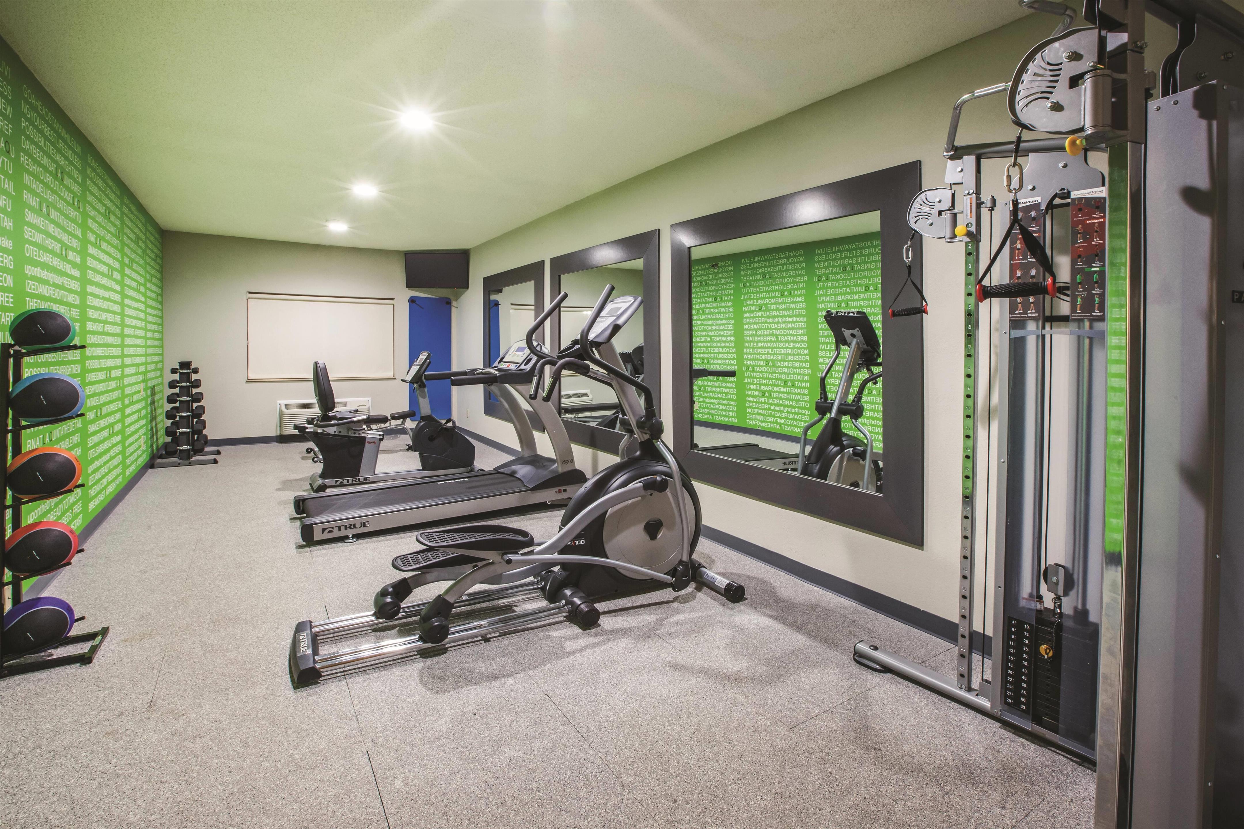 Health club fitness center gym | La Quinta Inn by Wyndham Indianapolis North at Pyramids