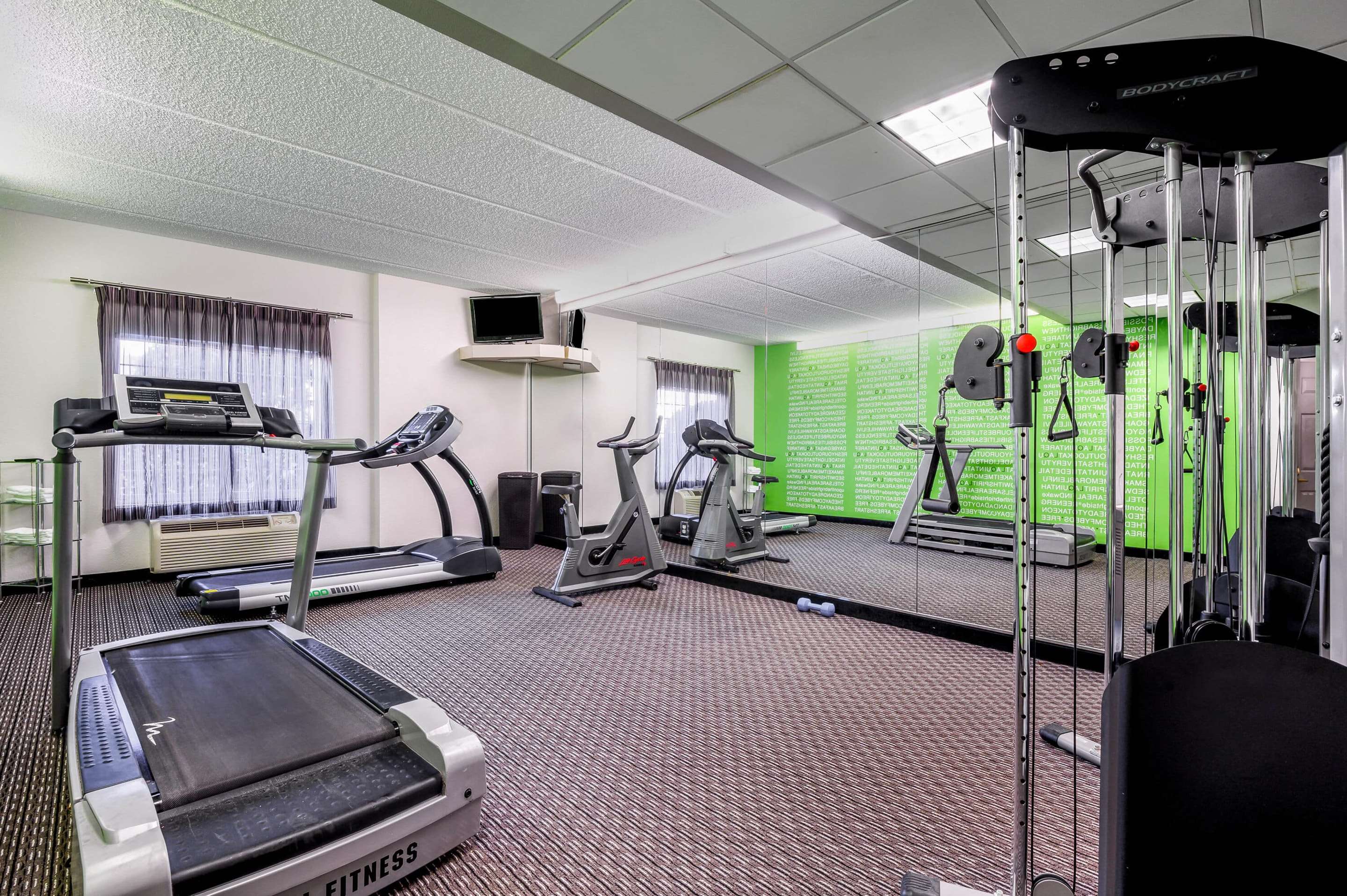 Health club fitness center gym | La Quinta Inn & Suites by Wyndham Myrtle Beach Broadway Area